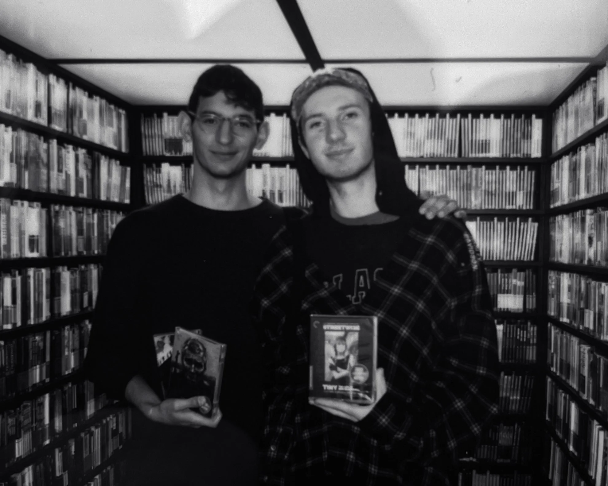 Ahmed Elhennawy and Christopher Clucas inside the Criterion Closet Mobil Van at New York Film Festival at Lincoln Center.