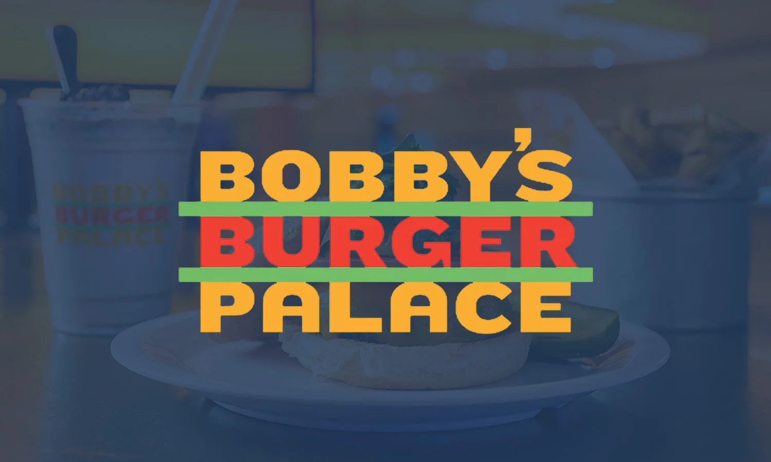 Bobby's Burger Palace logo over a background of a burger and soft drink on a table.