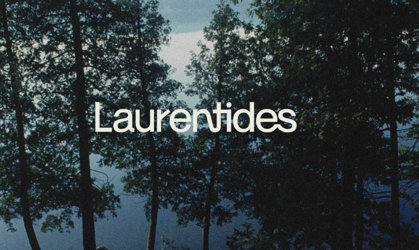 Text overlay reading 'Laurentides' on a background of trees and a cloudy sky.