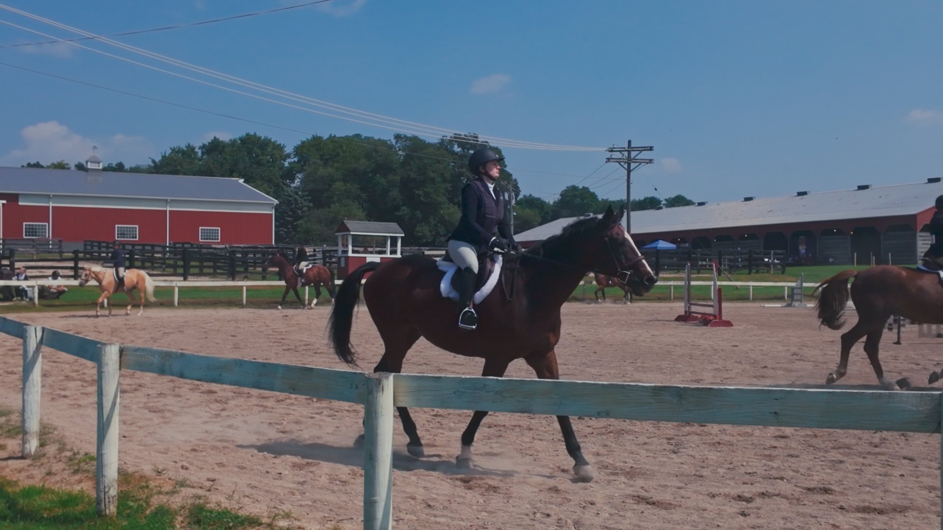 Teresa M. rides Max the horse in a competition