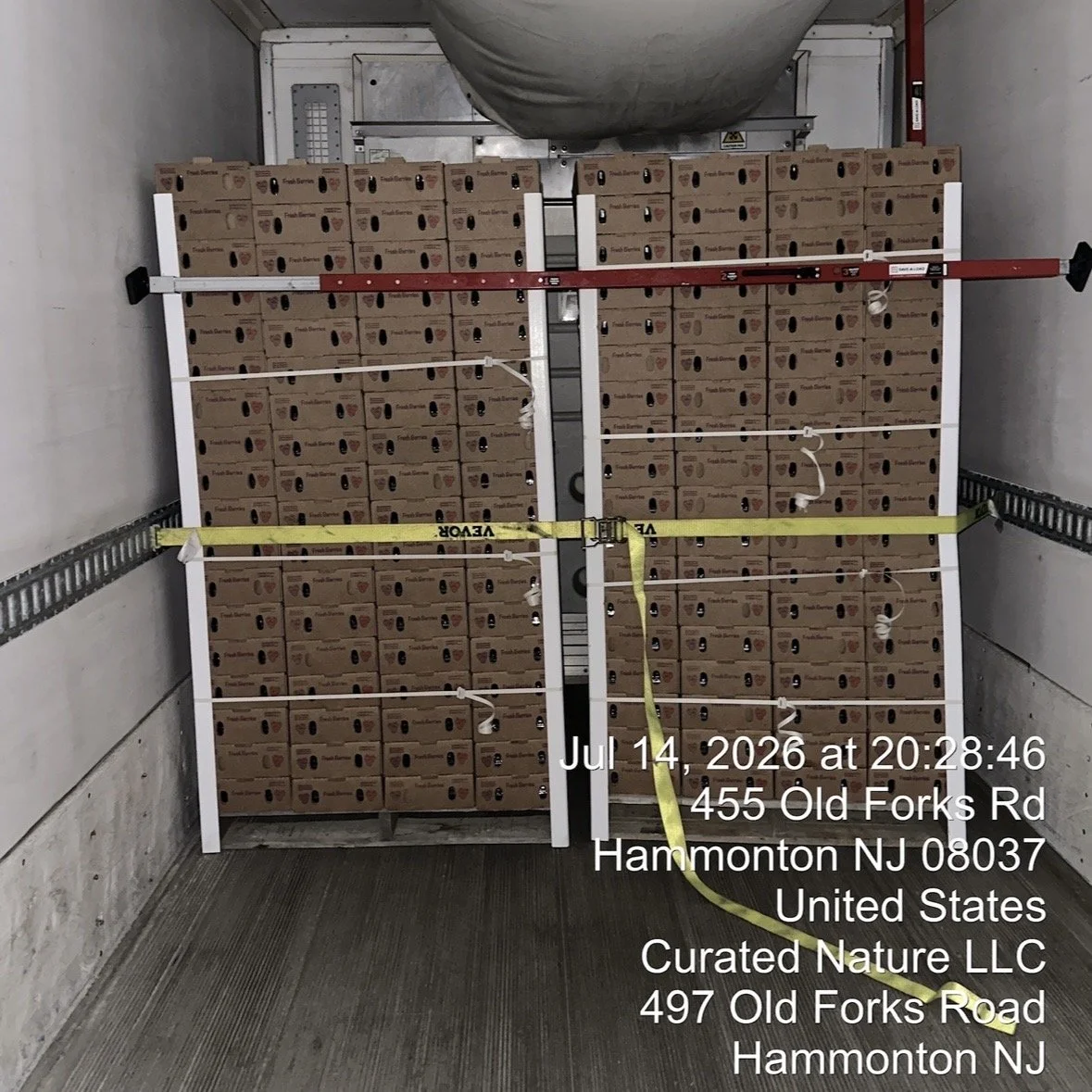Pallets of fruit in the 34 °F walk-in cooler after culling and inspection at Curated Nature, Hammonton NJ