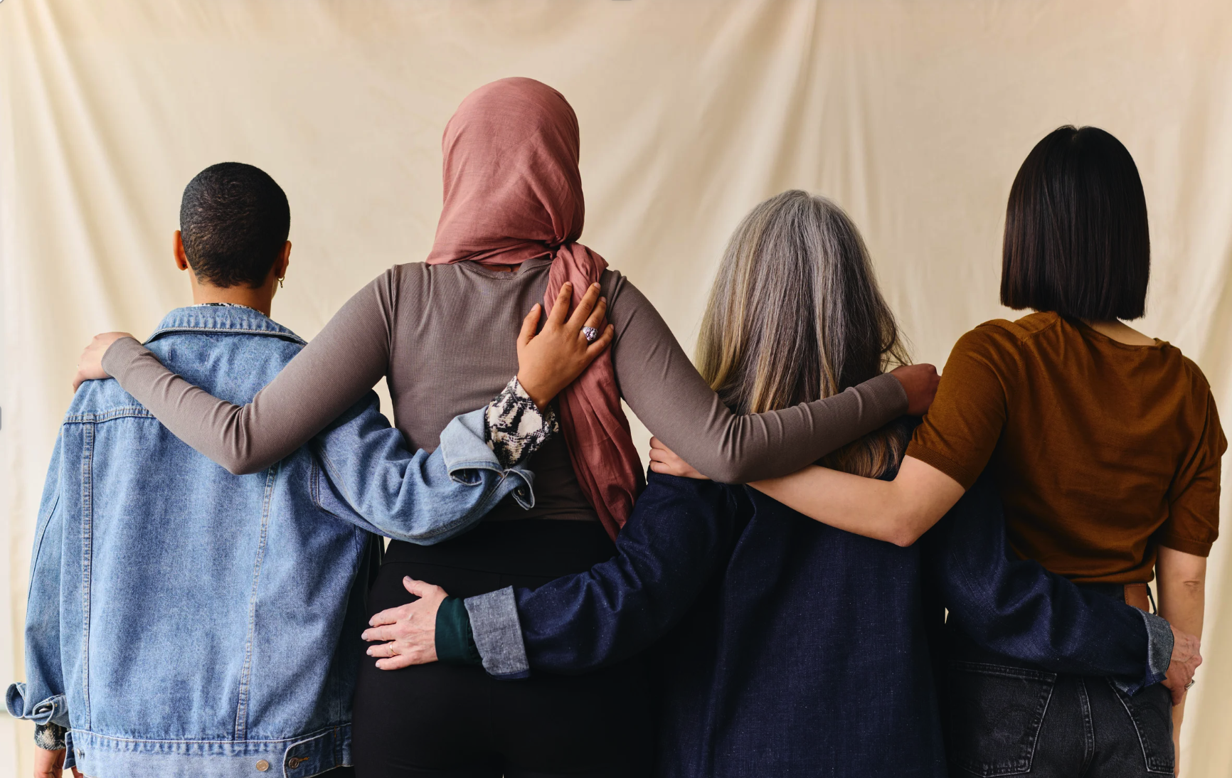 Diverse group standing together representing belonging and shared identity among second-generation adults and diaspora communities.