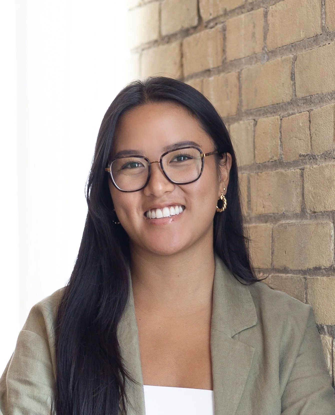 Emillie Erum, Registered Psychotherapist in Halton, Ontario, providing somatic and trauma-informed therapy for BIPOC individuals