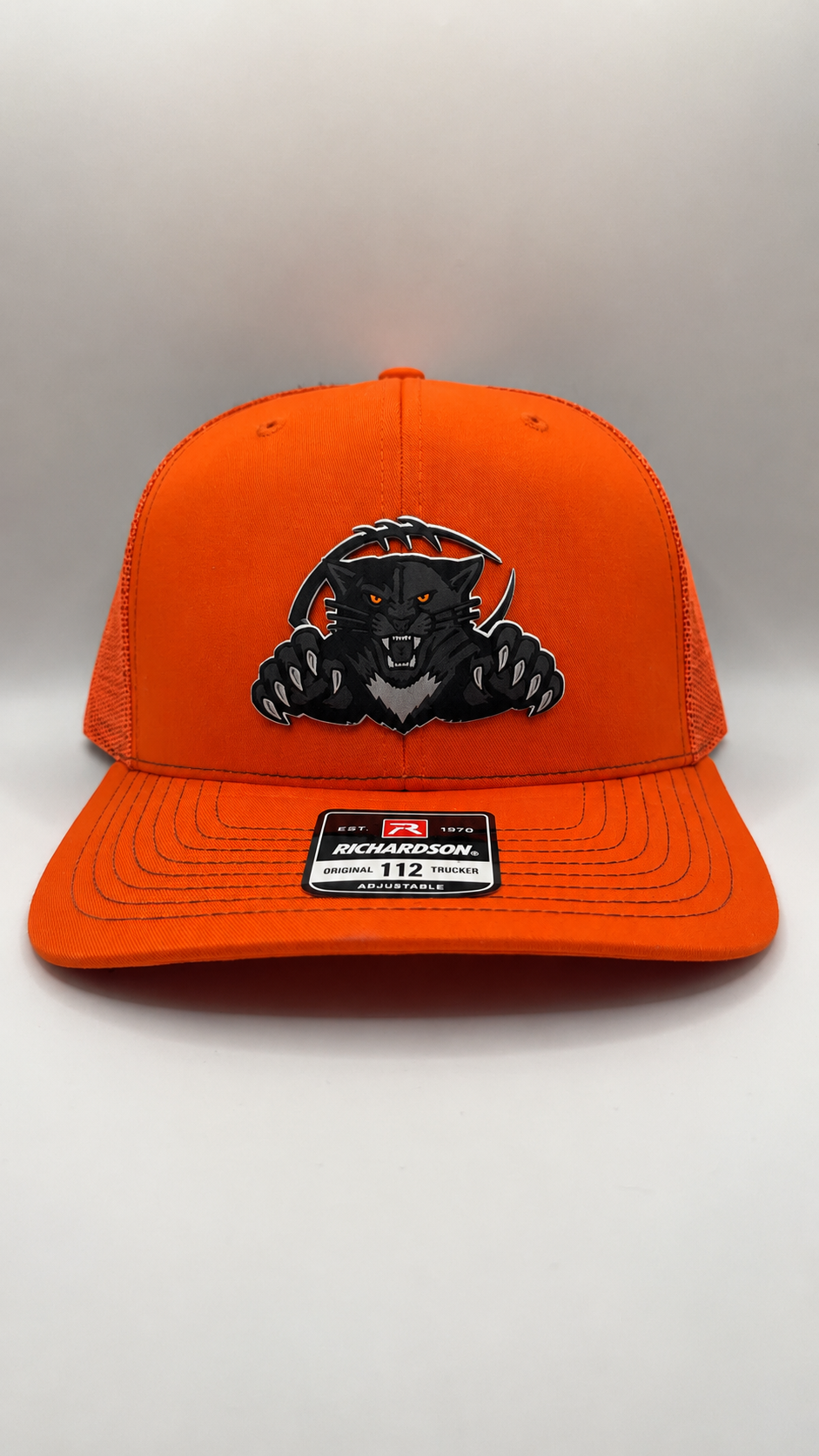 Orange adjustable black cat w football.PNG