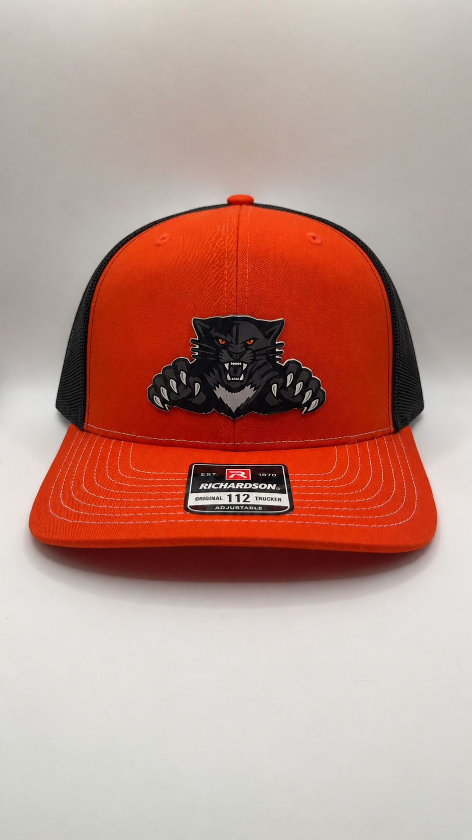 Orange and black adjustable with black cat.PNG