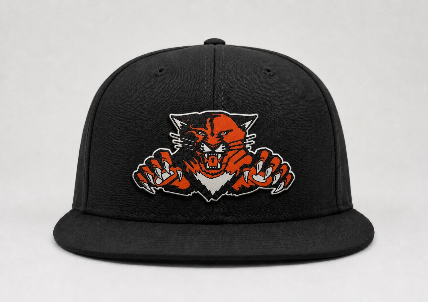 Black stretch fit with orange cat.PNG