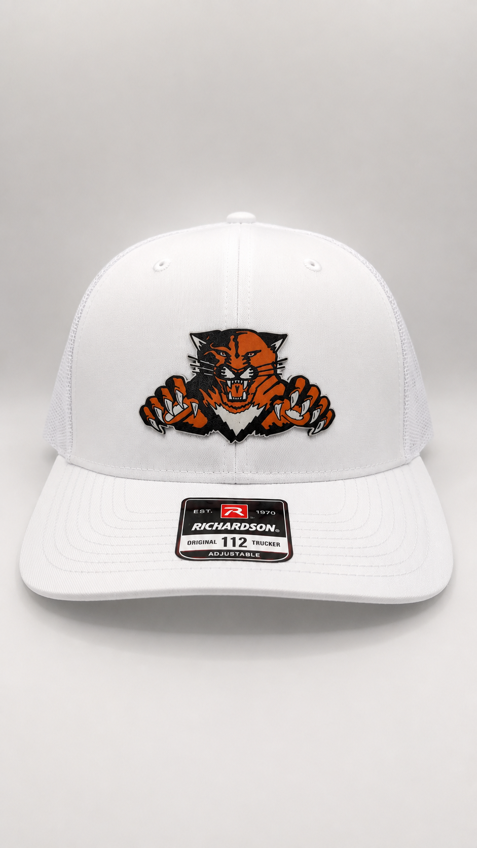 White Trucker Hat with Orange Logo