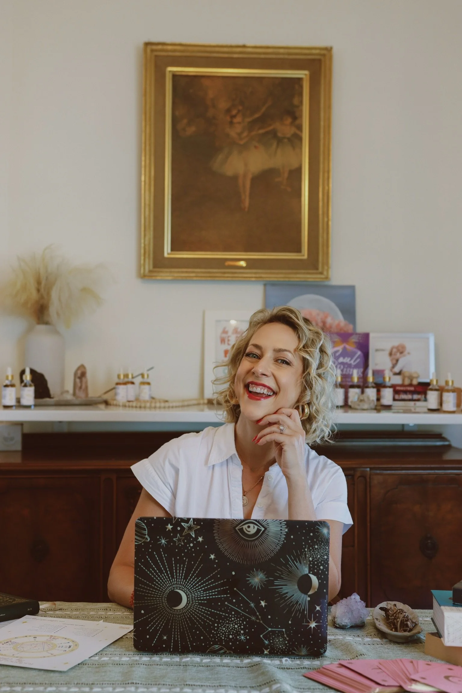 Rebecca of Radiance Astrology at her computer prepping for a Radiance Astrology Reading