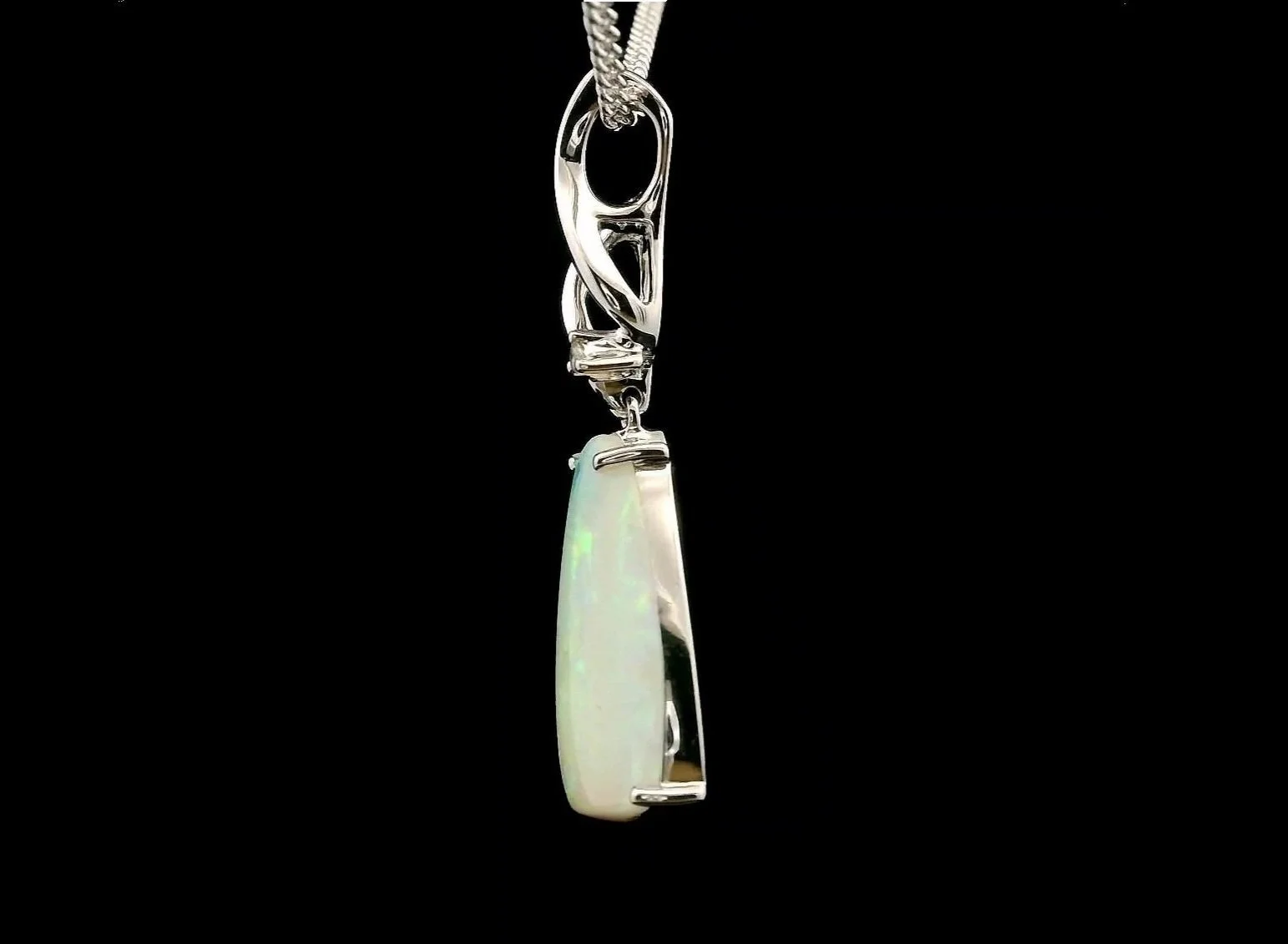 Left side view 14K White Gold Coober Pedy Light Opal and Diamond Pendant