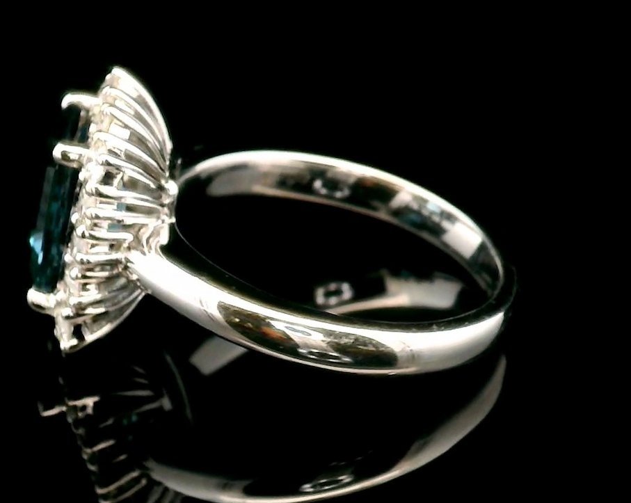 Left side view 18K White Gold London Blue Topaz and Diamond Ring