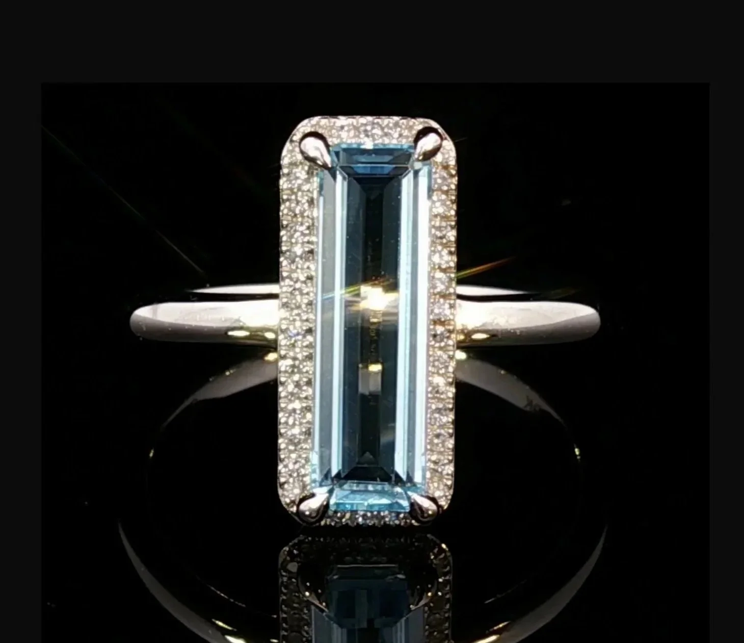 9K White Gold Blue Topaz and Diamond Ring