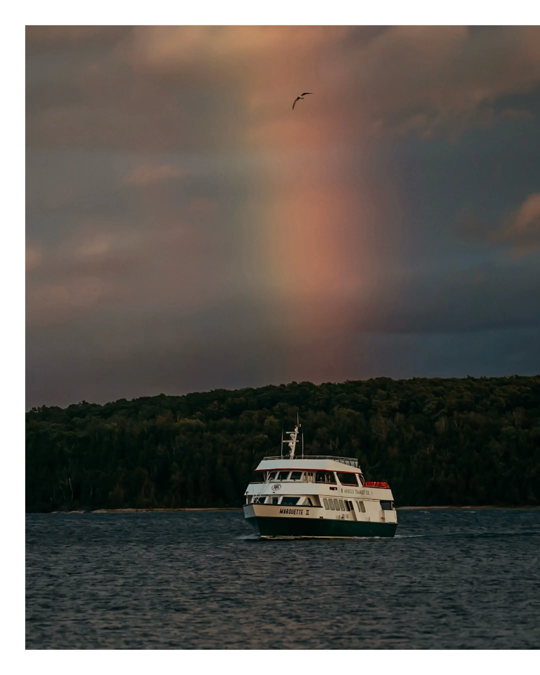 This weekend was busy, but somehow felt slower with its cool air and fall vibes. Last night I caught a glimpse of this gorgeous half rainbow reach across the channel to Round Island. 🌈🌊💚

🏷️ @arnoldtransitcompany &bull; @sipnsail_mackinac &bull; 