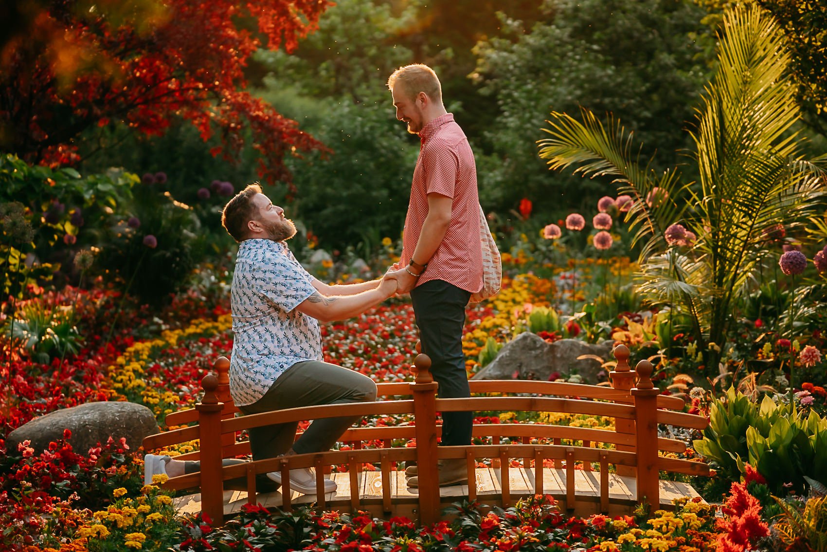 Golden hour proposal in the secret garden on Mackinac Island in August.