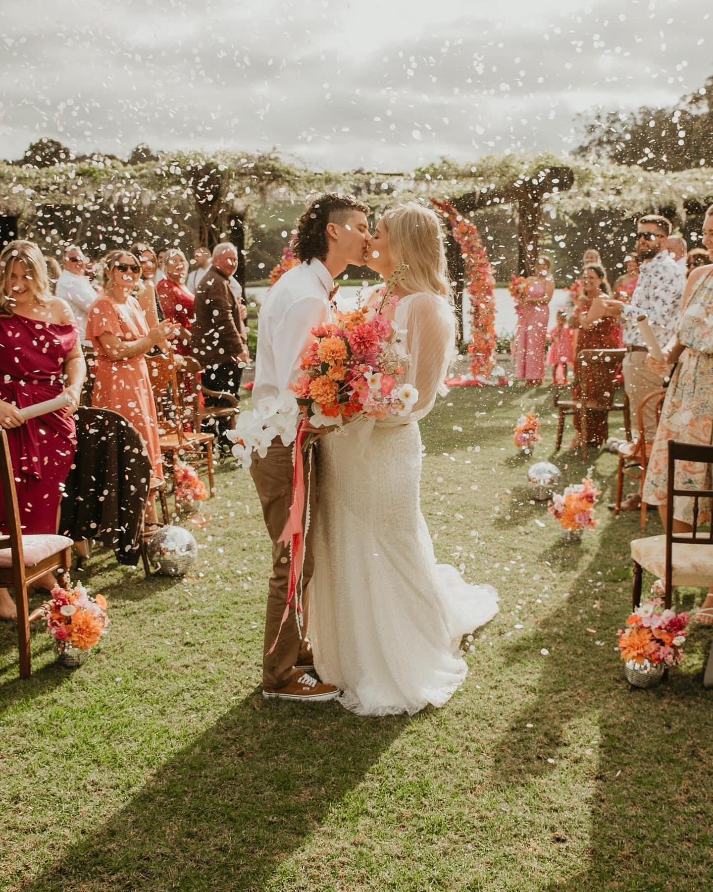 A night to remember! Celebrating the incredible Mr &amp; Mrs Smith with a colorful disco themed wedding&mdash;full of love, laughter, and dancing the night away! 💃🏻 🪩🧡💗

Photographer @oliveandcophotography 
Videographer @truelovestoryweddings 
D