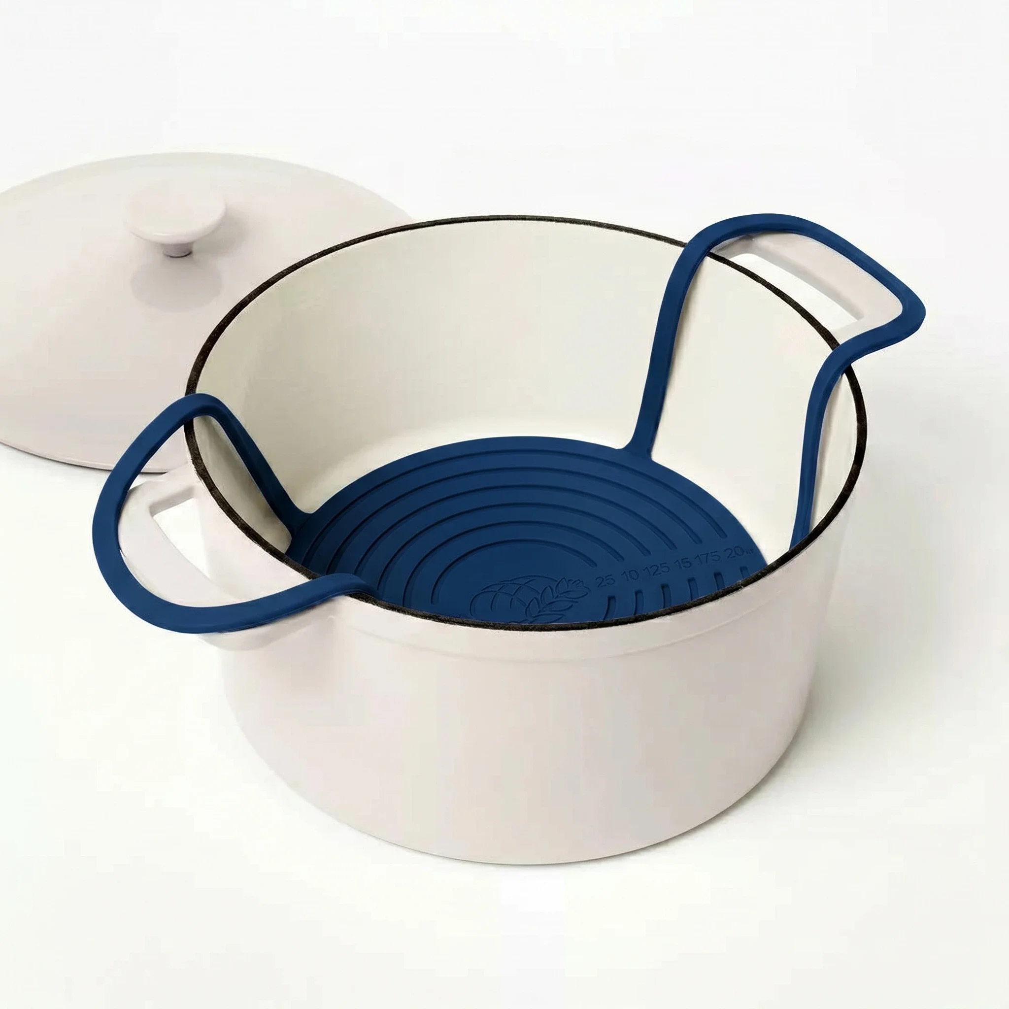 Blue round silicone bread sling for baking sourdough in a Dutch oven