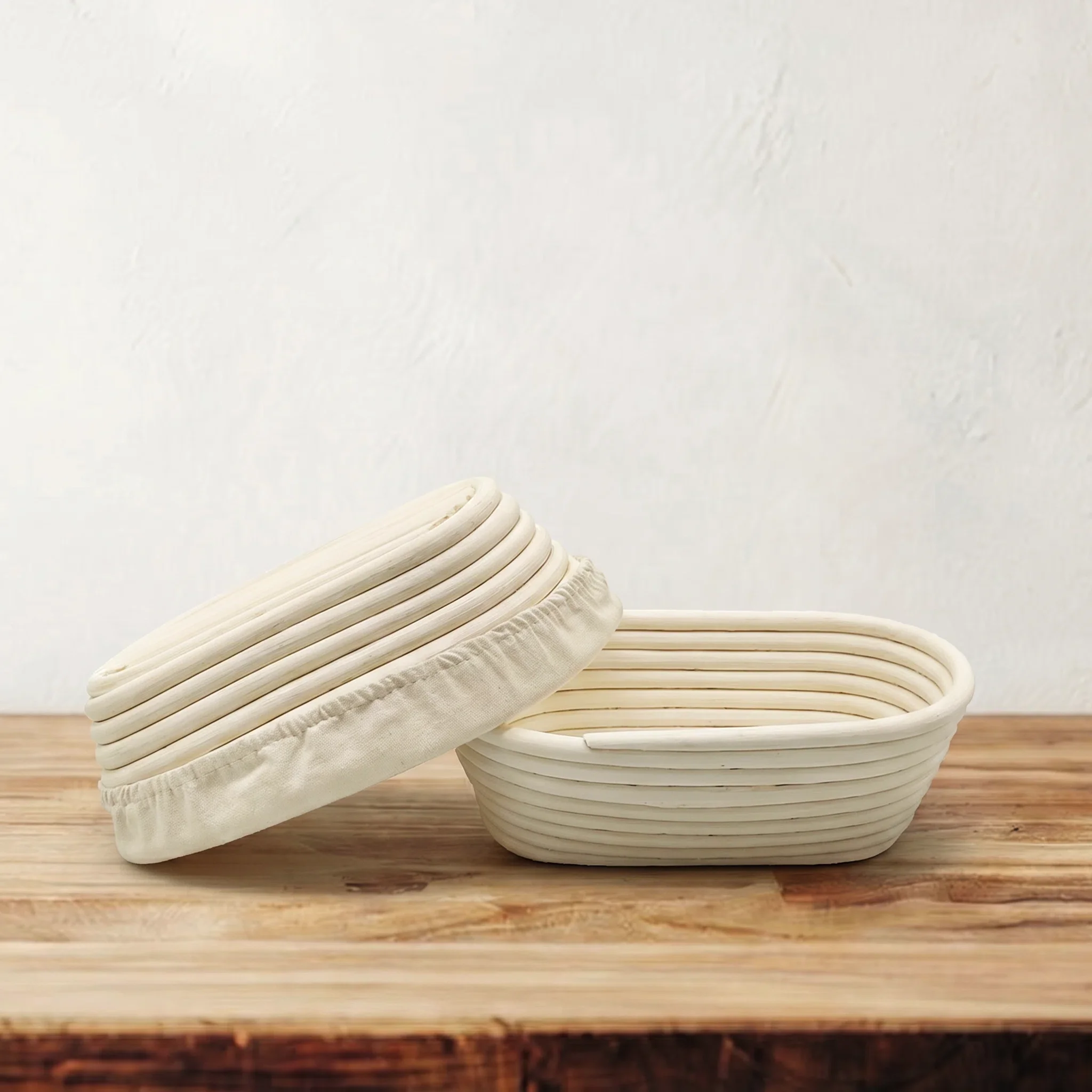 2-piece 10-inch rattan banneton basket bundle with liner and woven detail