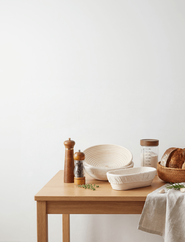 Handwoven rattan banneton baskets on a cozy kitchen counter