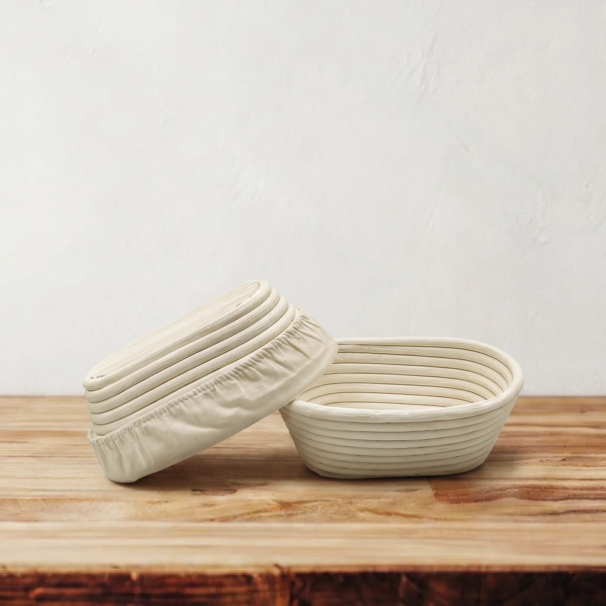 2-piece 8-inch rattan banneton basket bundle with liner and woven detail