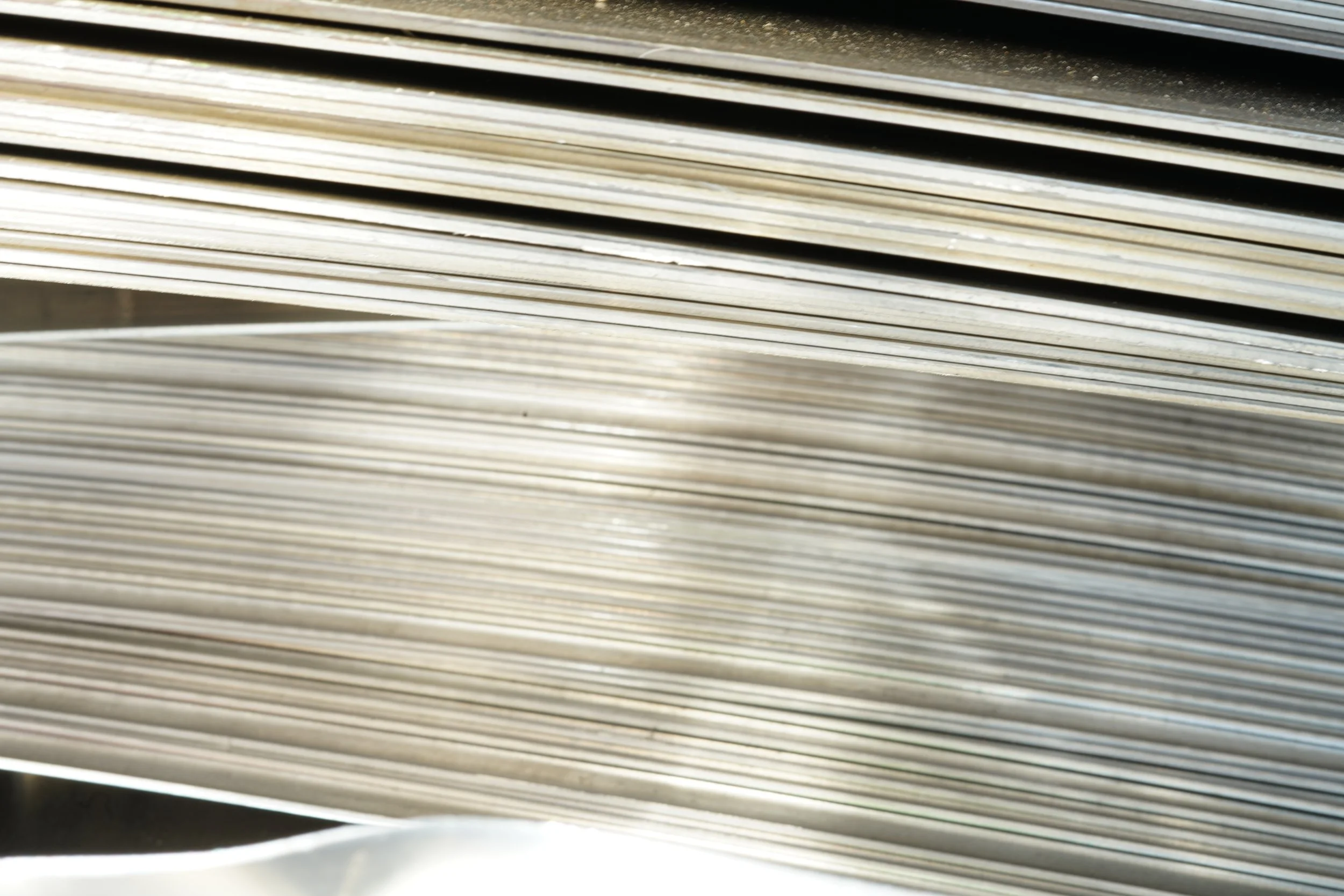 Close-up of a stack of metal sheet piles.