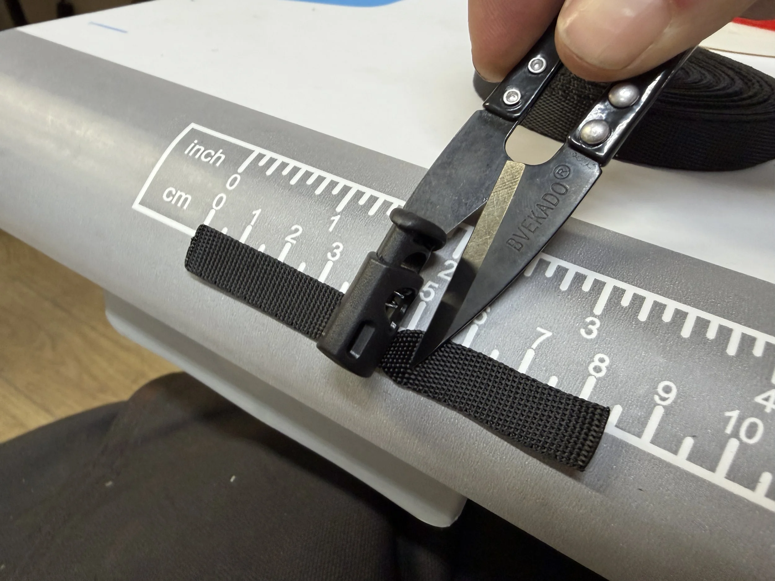 Cut 10mm webbing and feed through stopper.