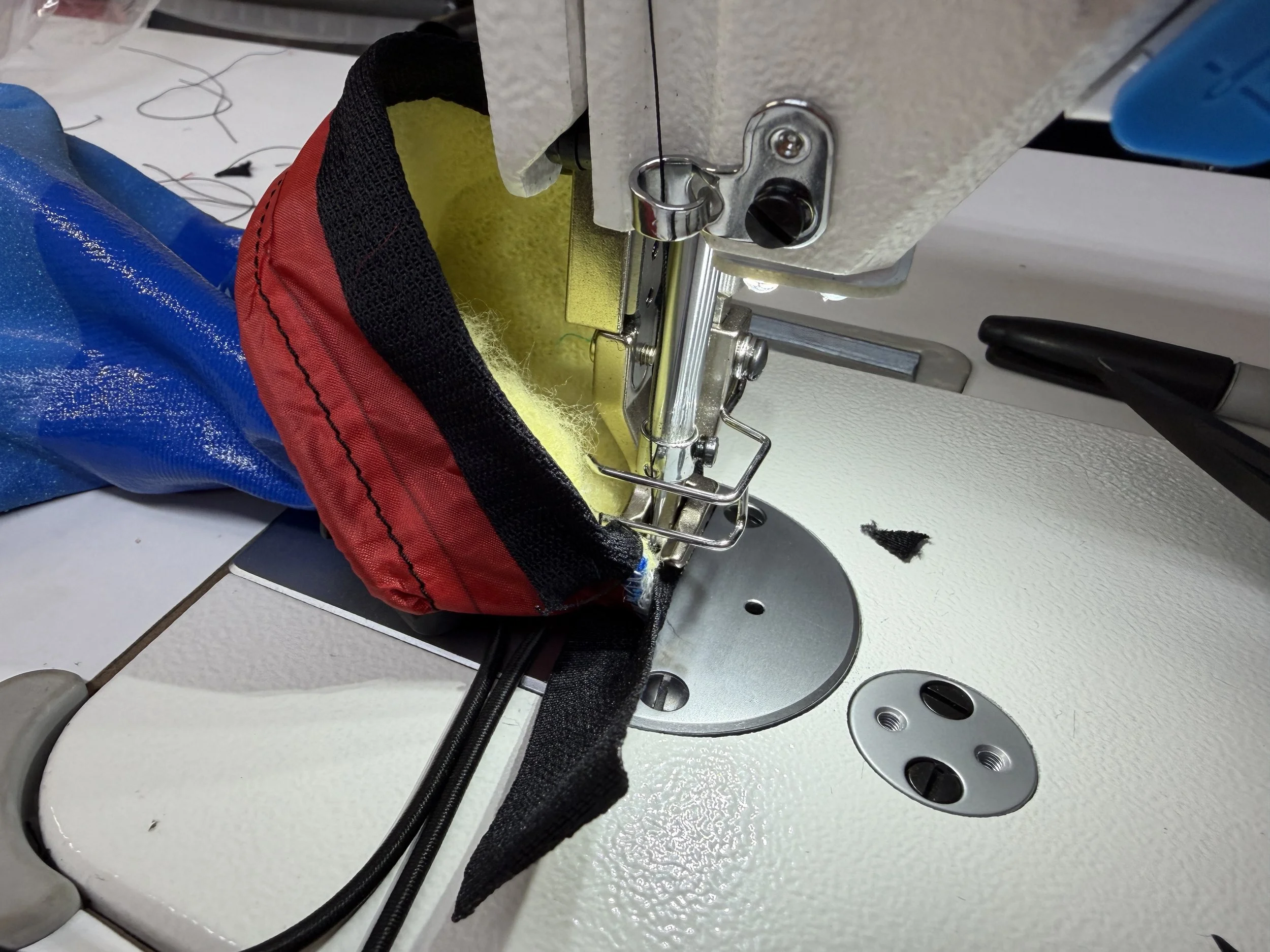 25 mm webbing captures the lining, rubber and gauntlet nicely and helps it look cleaner inside.