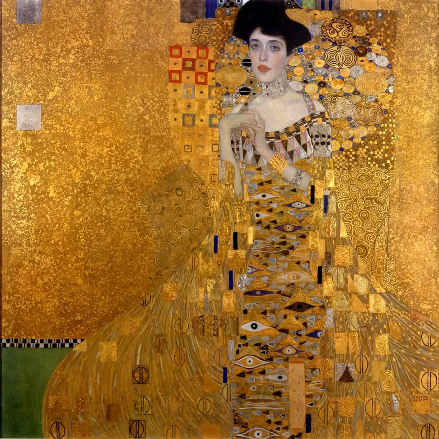 Gustav Klimt's famous oil painting, Portrait of Adele Bloch-Bauer I. A delicate woman with fair skin and dark hair is surrounded by geometric patterns on a rich field of gold.