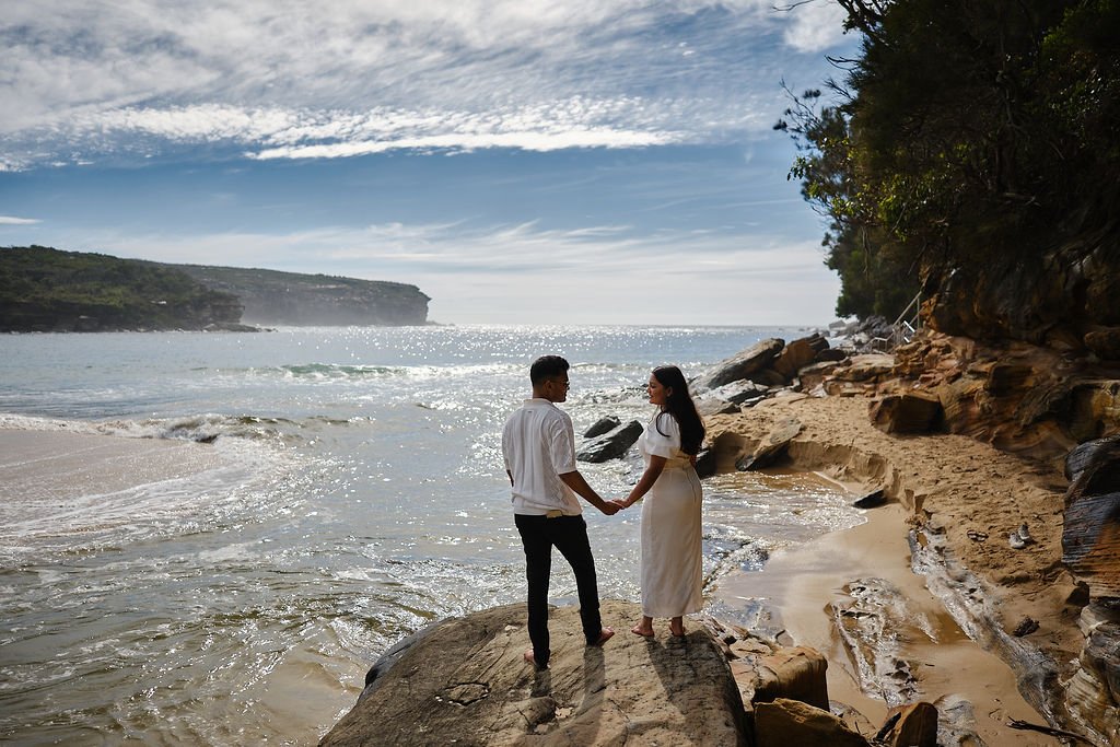 Couple at a coastal proposal location in Royal National Park Sydney