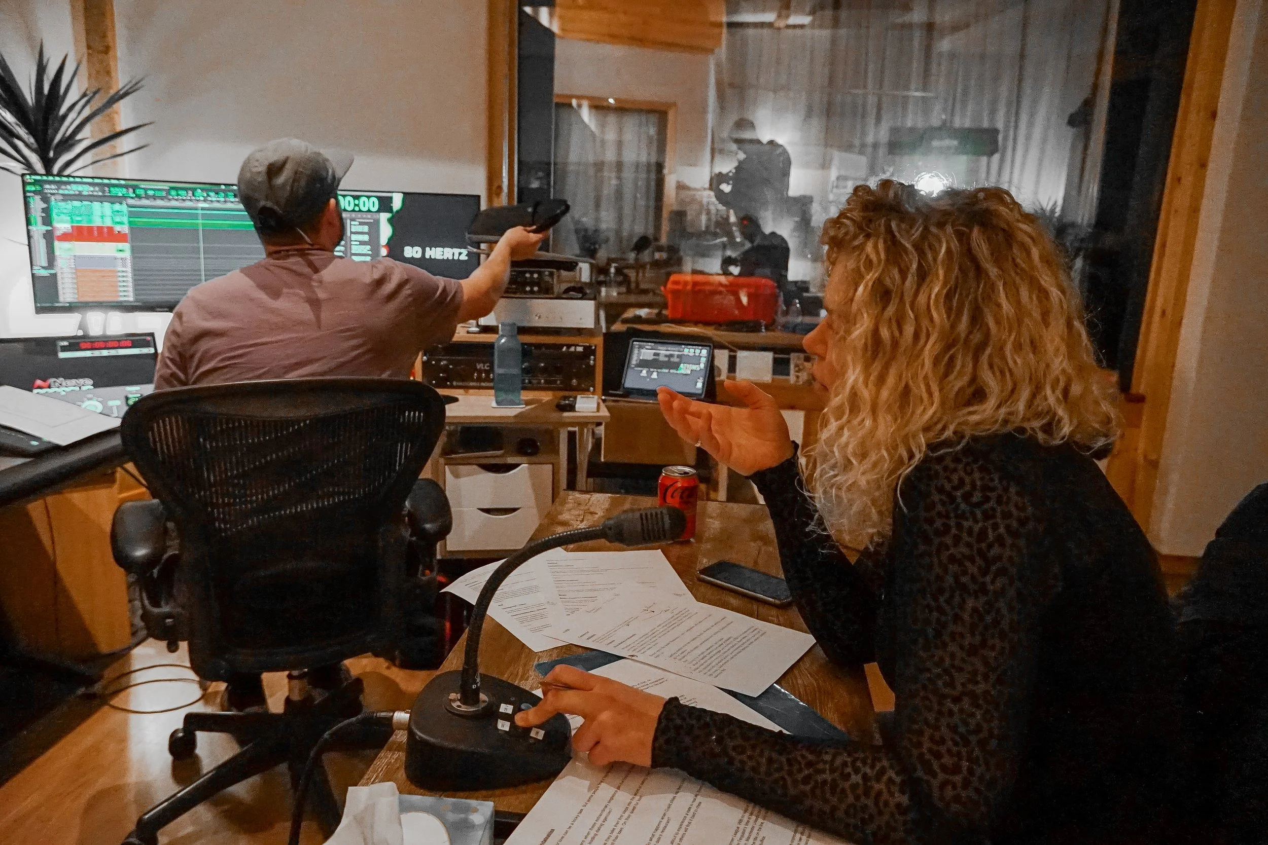 Participants in the Here Talent Studio Voiceover Masterclass 2026 practicing voice acting in a professional recording studio with instructor Fiona Boylan.