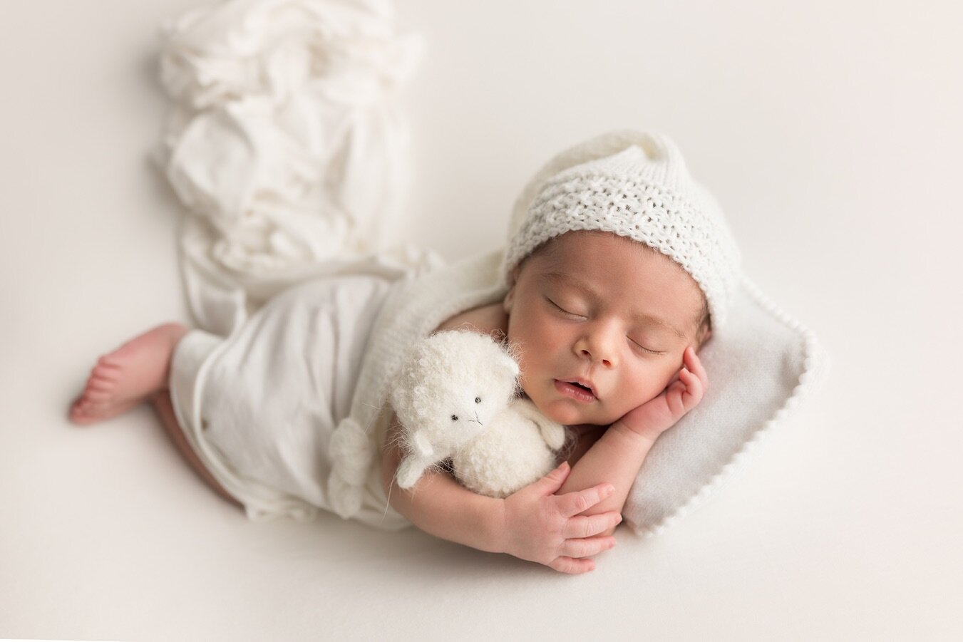 Just the cutest baby, sleeping peacefully.  For new parents this is one of their favorite moments to admire the perfection of every detail of their baby.
When are these photo sessions done?  Ideally around 10 days after birth. 
#newbornphotographer #