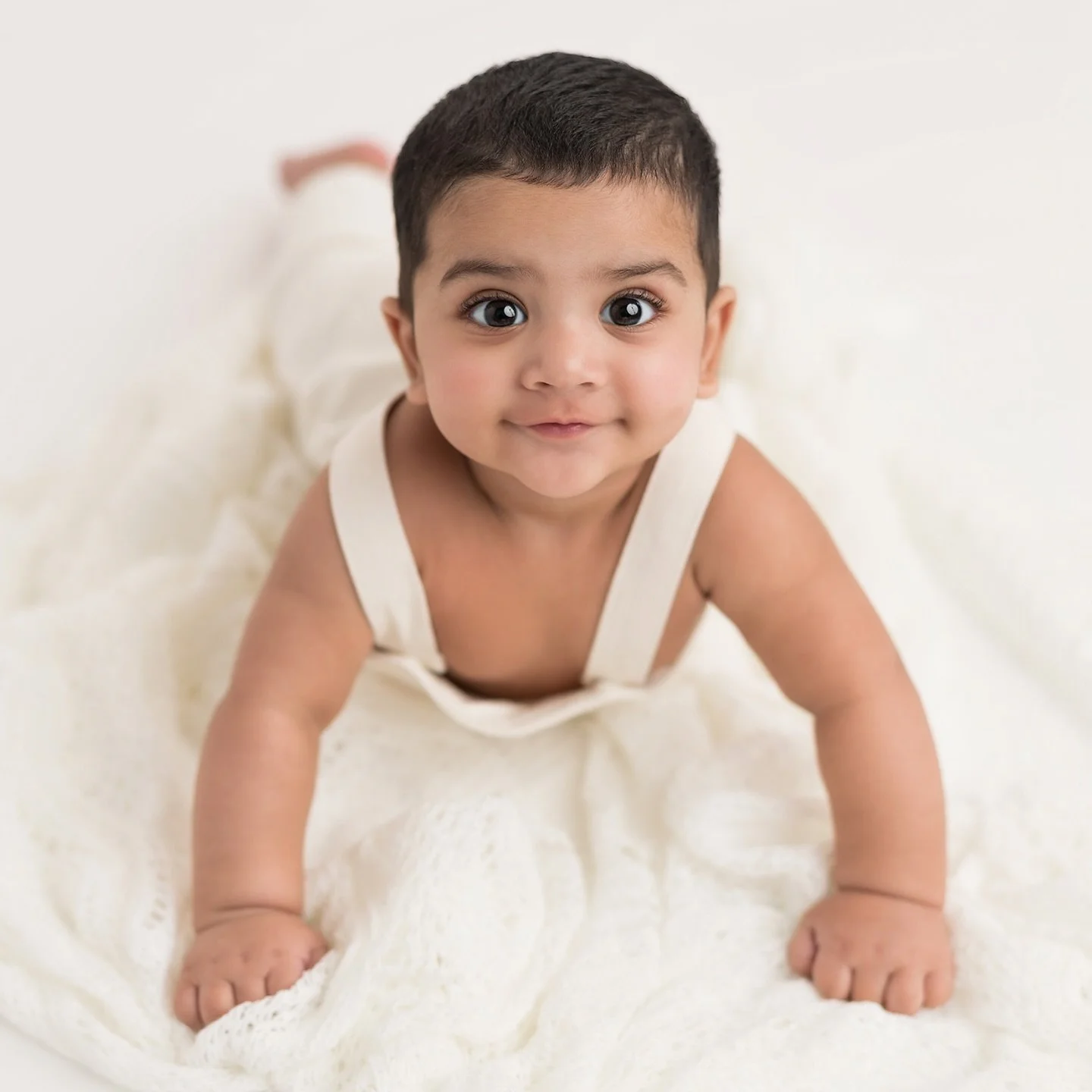 The Sitter. 
One of the most rewarding photoshoots is capturing babies between 6 and 9 months old, right after their newborn session and just before they hit the one-year milestone. Witnessing and documenting the incredible transformation in their be