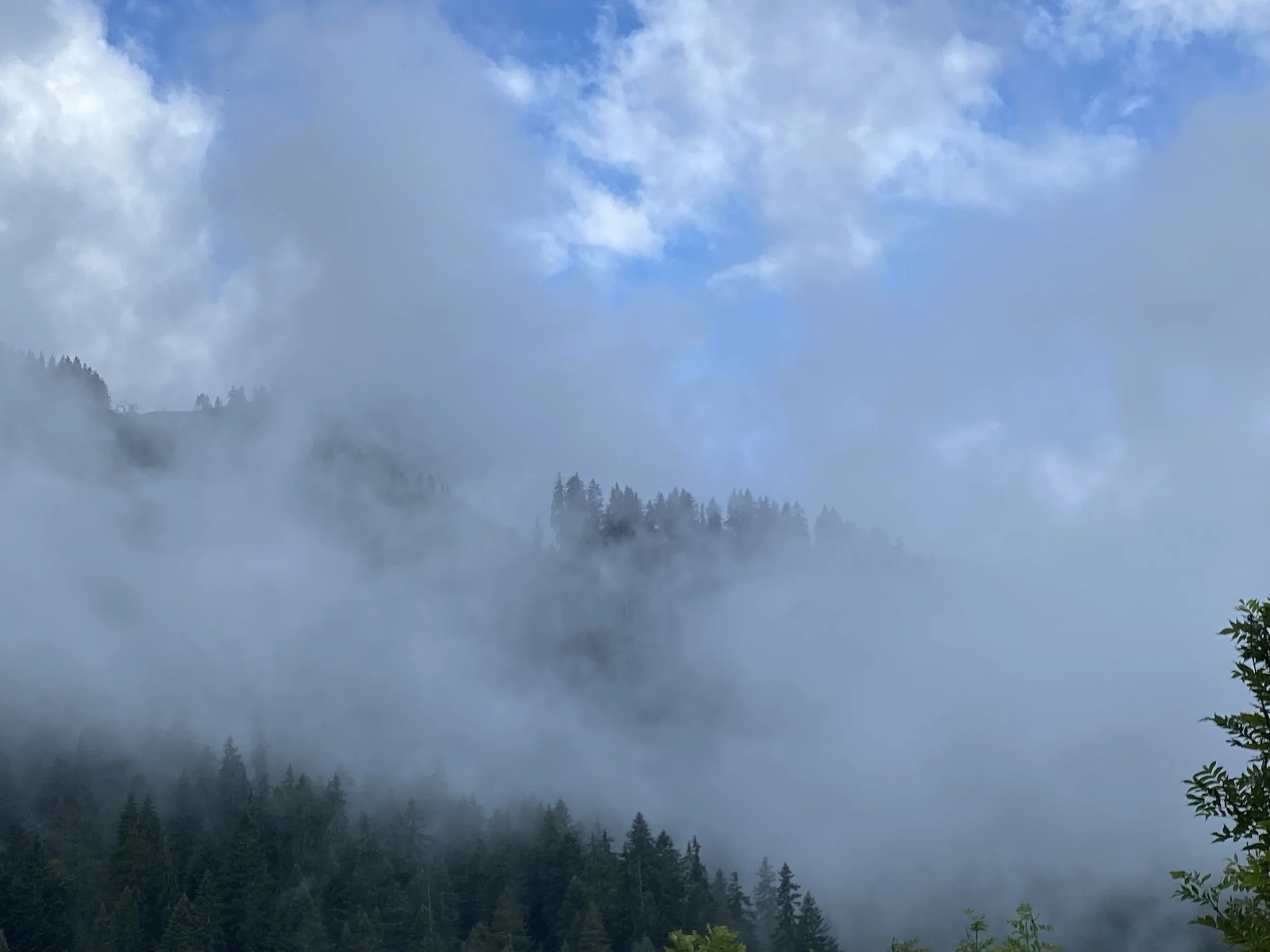 clouds almost obscuring mountains
