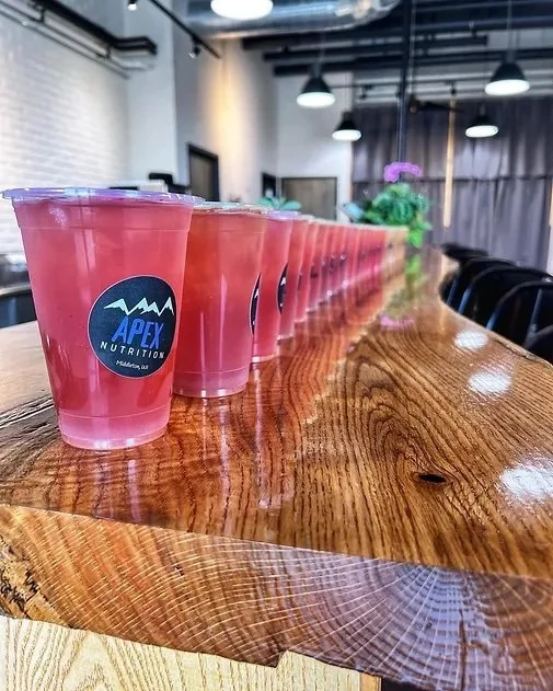 line of pink drinks at Apex Nutrtion
