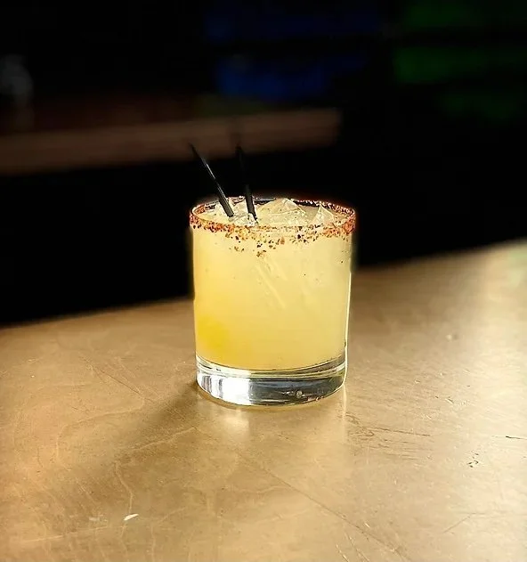 mixed drink resting on bar