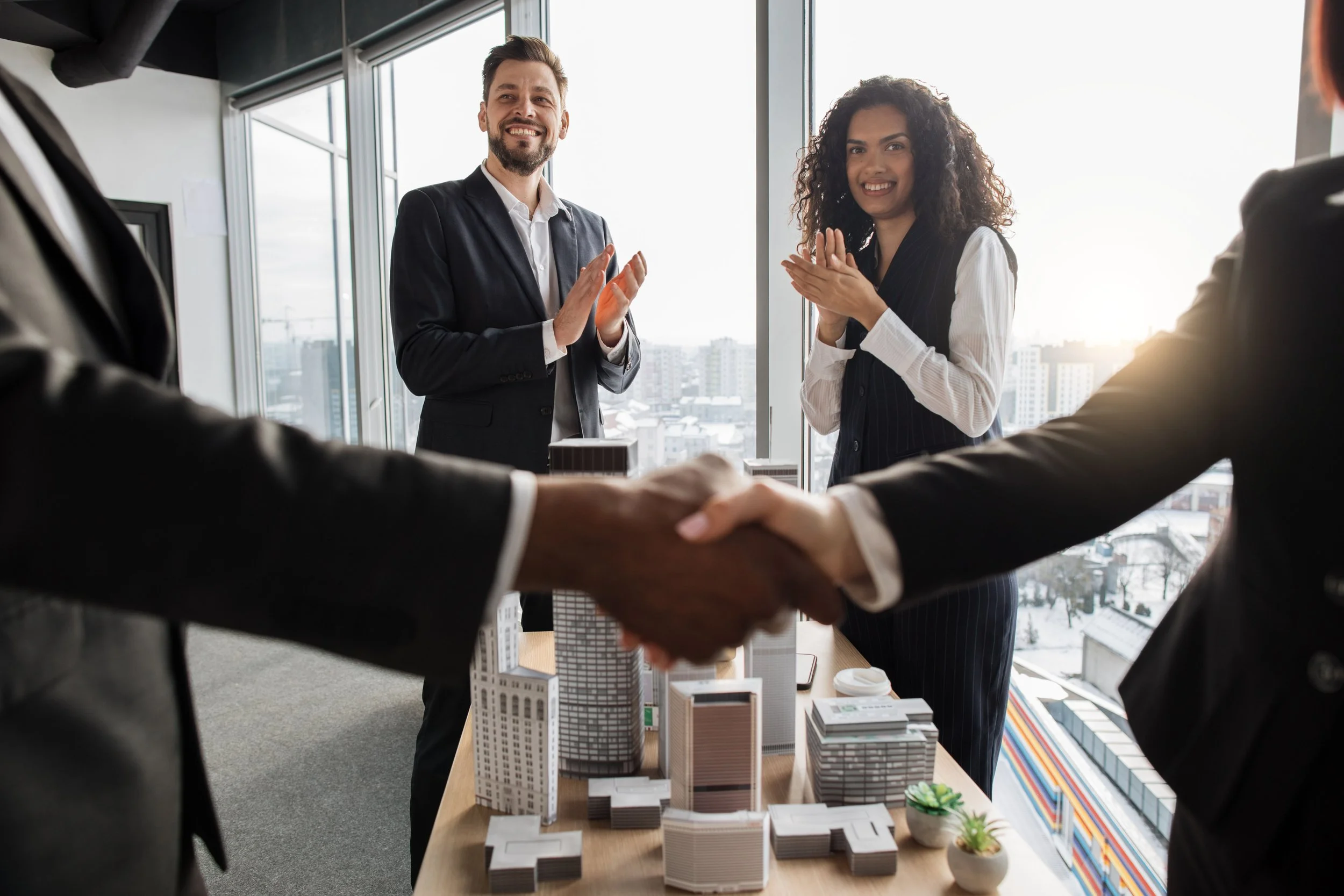 selective-focus-on-two-business-people-applauding-2024-12-13-01-41-46-utc.jpg