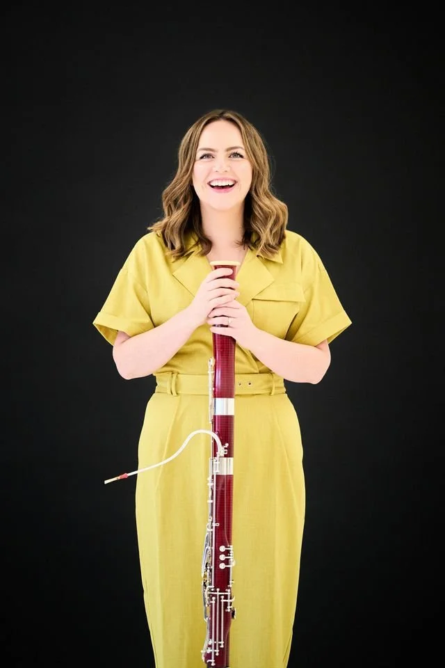 Amy yellow jumpsuit promo publicity 2026.jpeg