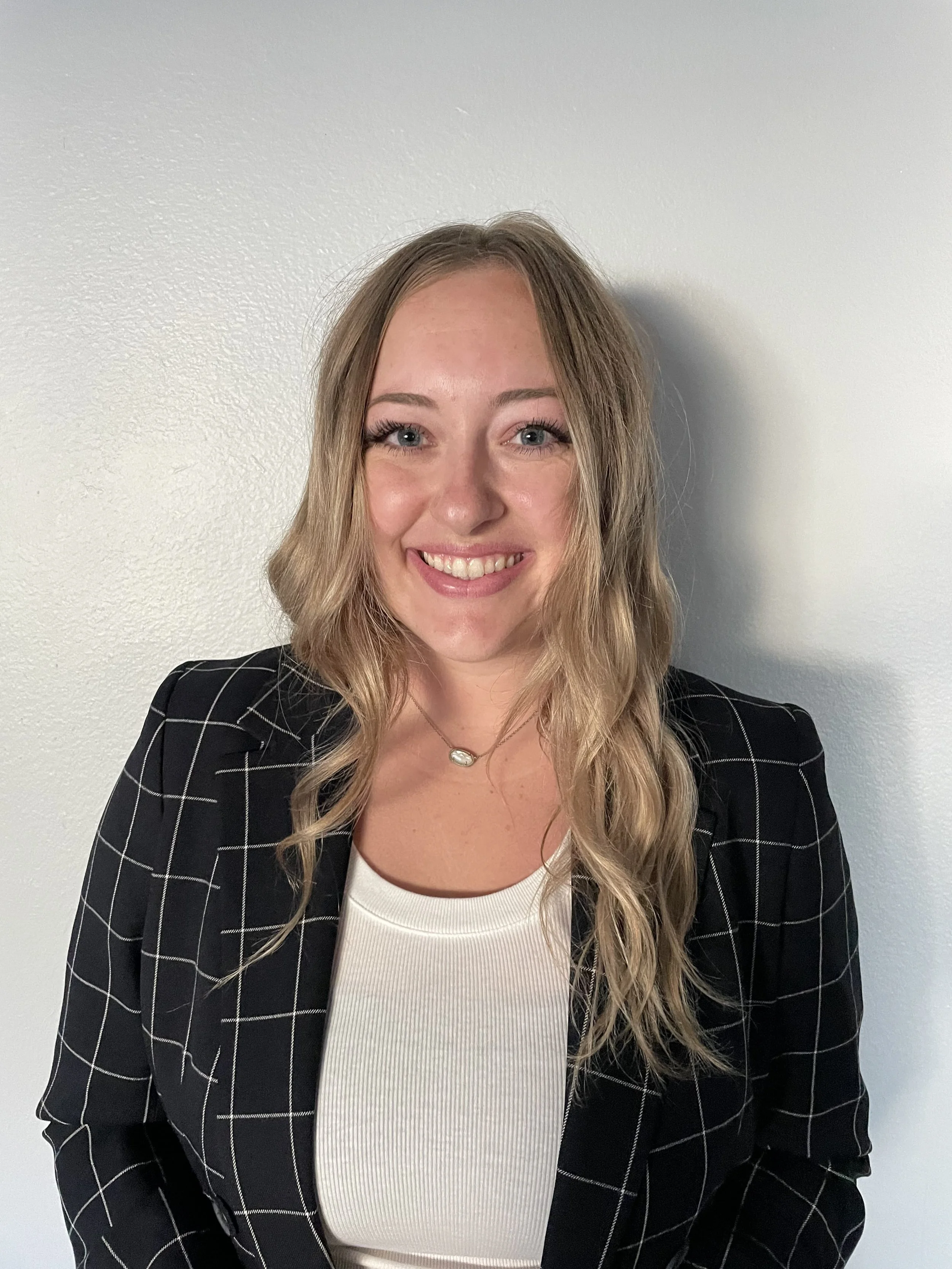 Carly - Headshot.jpeg