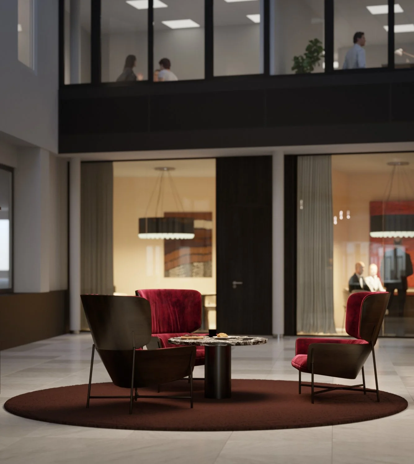Modern hotel's lobby area with a round brown rug, four chairs with red and dark wood finishes surrounding a small round marble-topped table, and an interior with large glass windows and doors showing people and furnishings inside.
