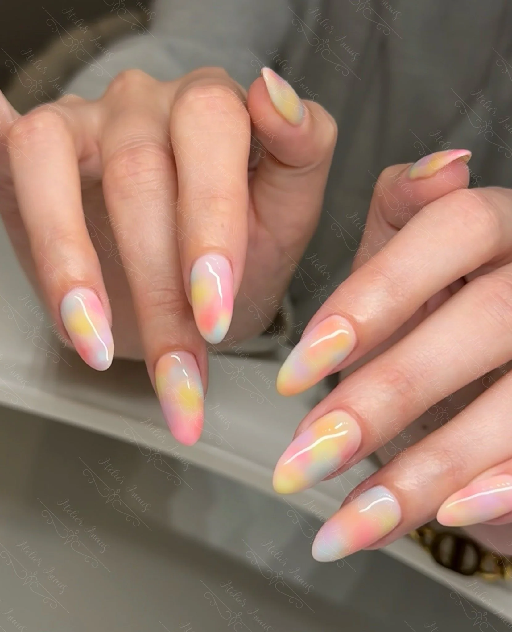 Long marble nails in rainbow at a nail salon in Old City. 