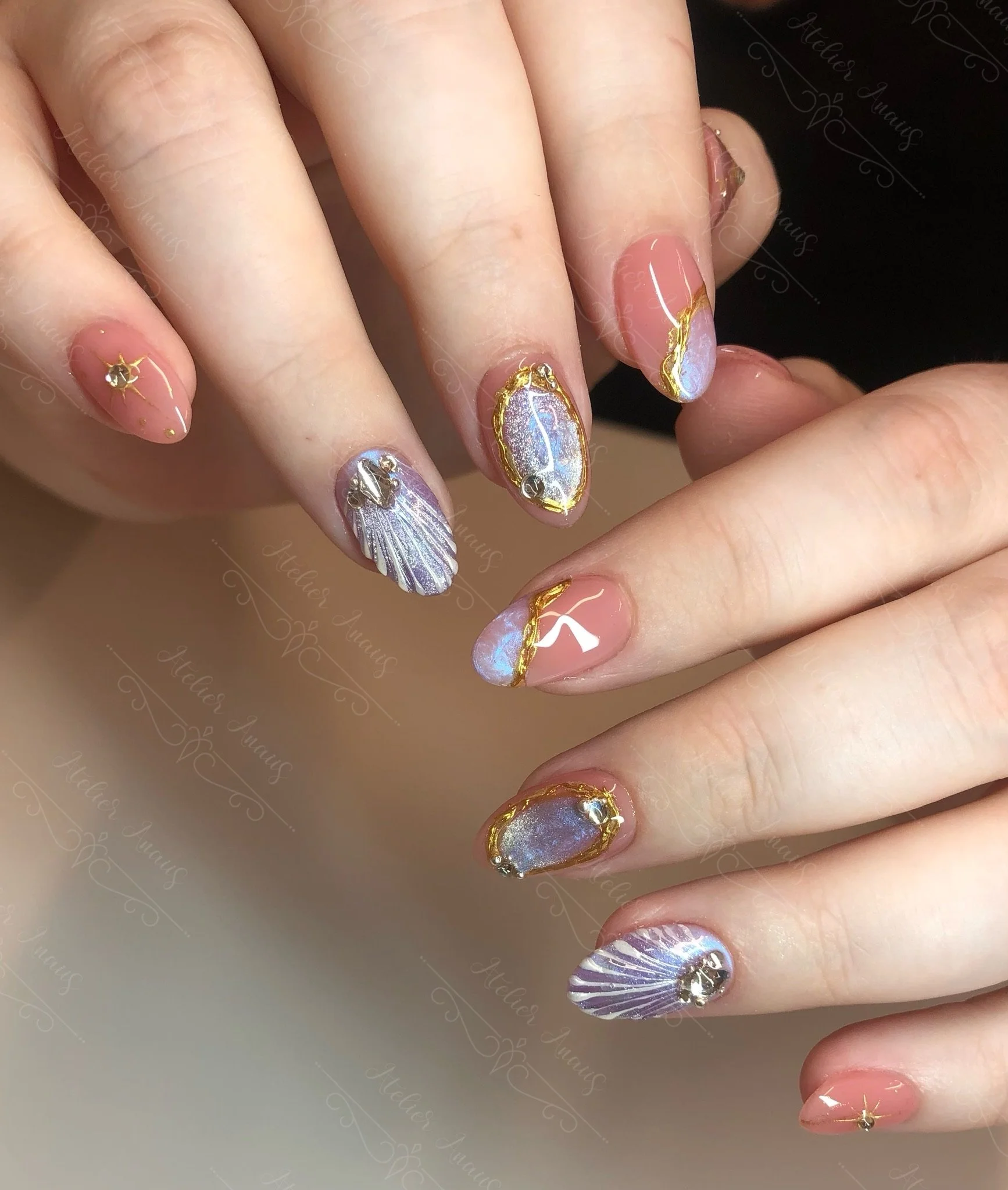 Embossed Nails with Seashells and Pearls in Pink