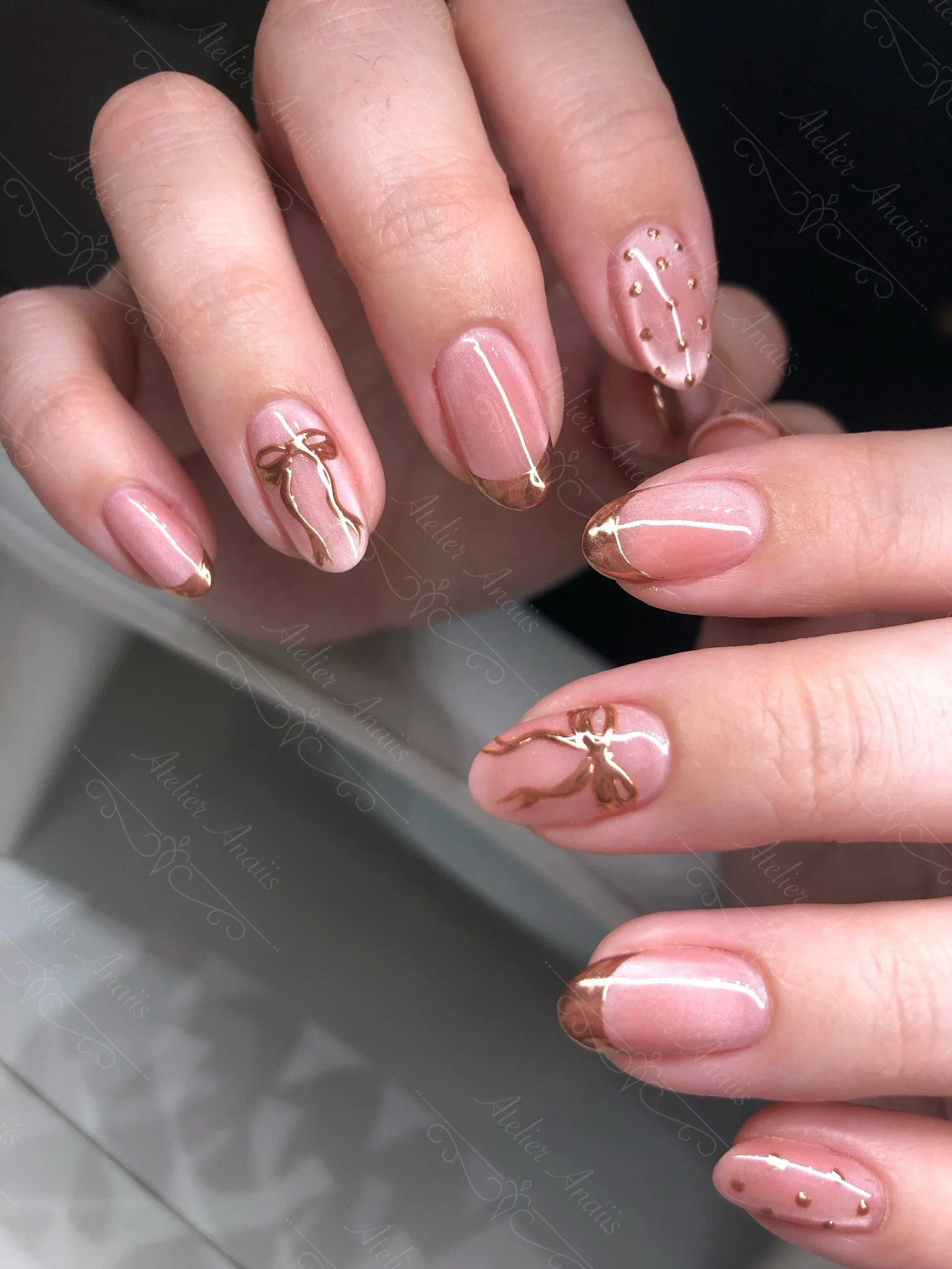 Classy French Nails with Gold Tips and Gold Bows
