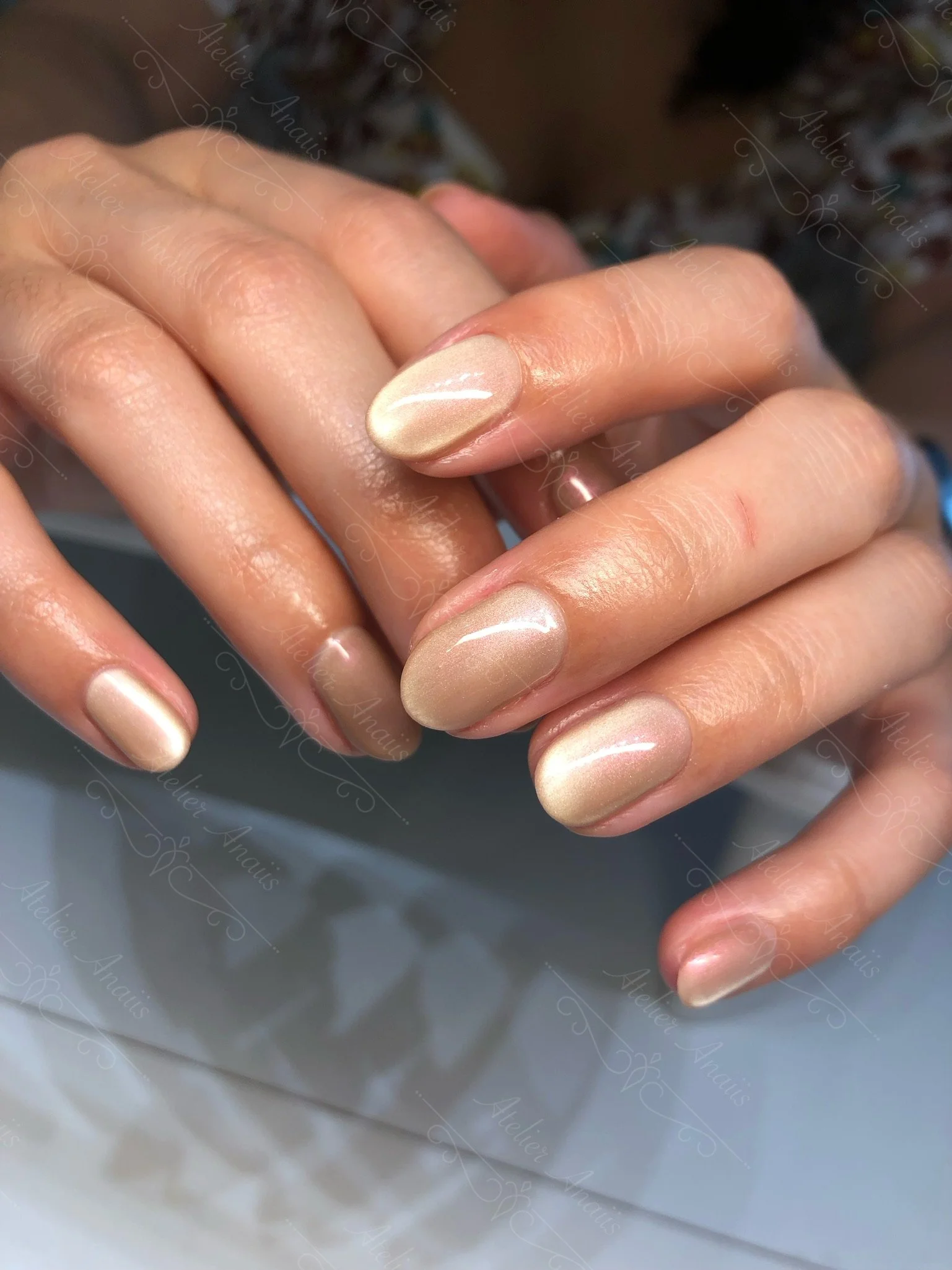 Medium nails featuring a natural nude white cat-eye velvet gel polish.