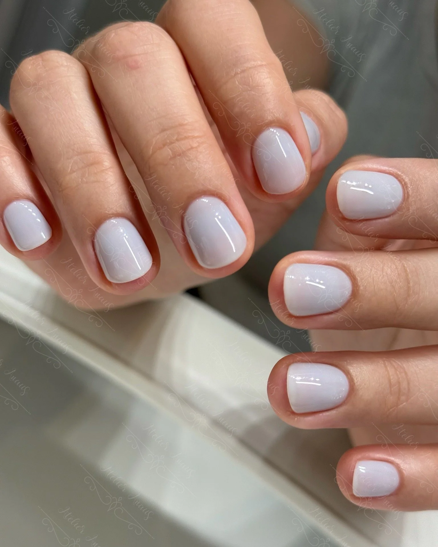 Beautiful short nails in slate gray. At Atelier Anaiis, Philadelphia's health-first nail salon.