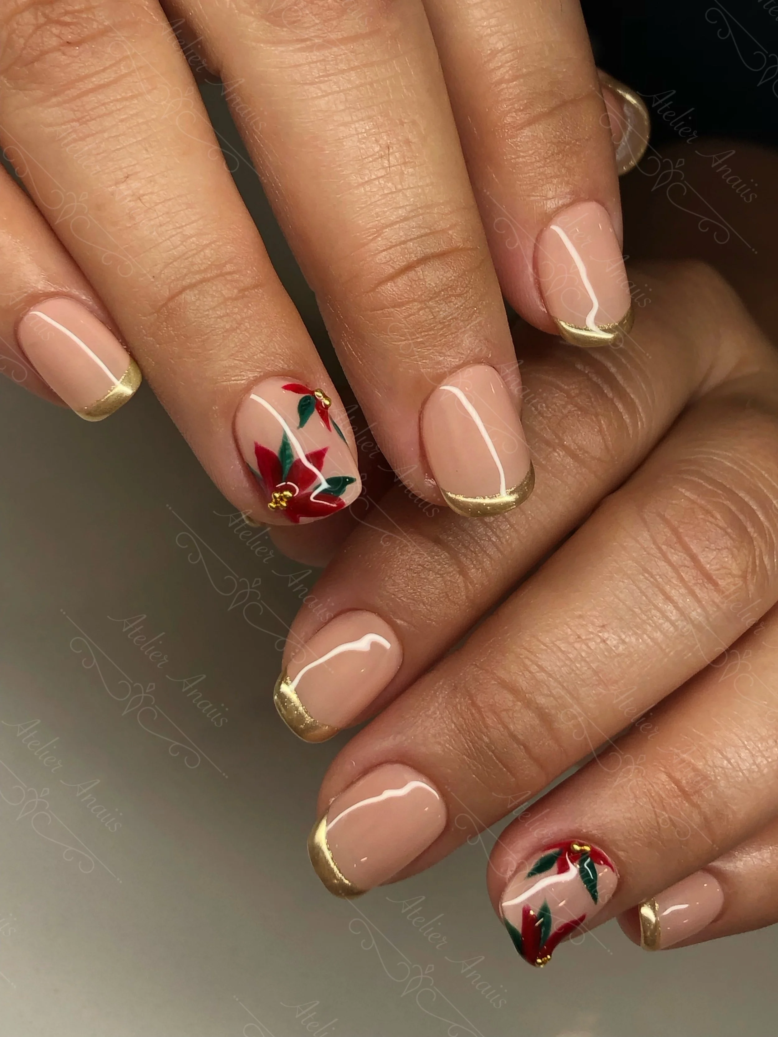 Classy Holiday French Nails with Gold Tips and Hand Drawn Poinsettia