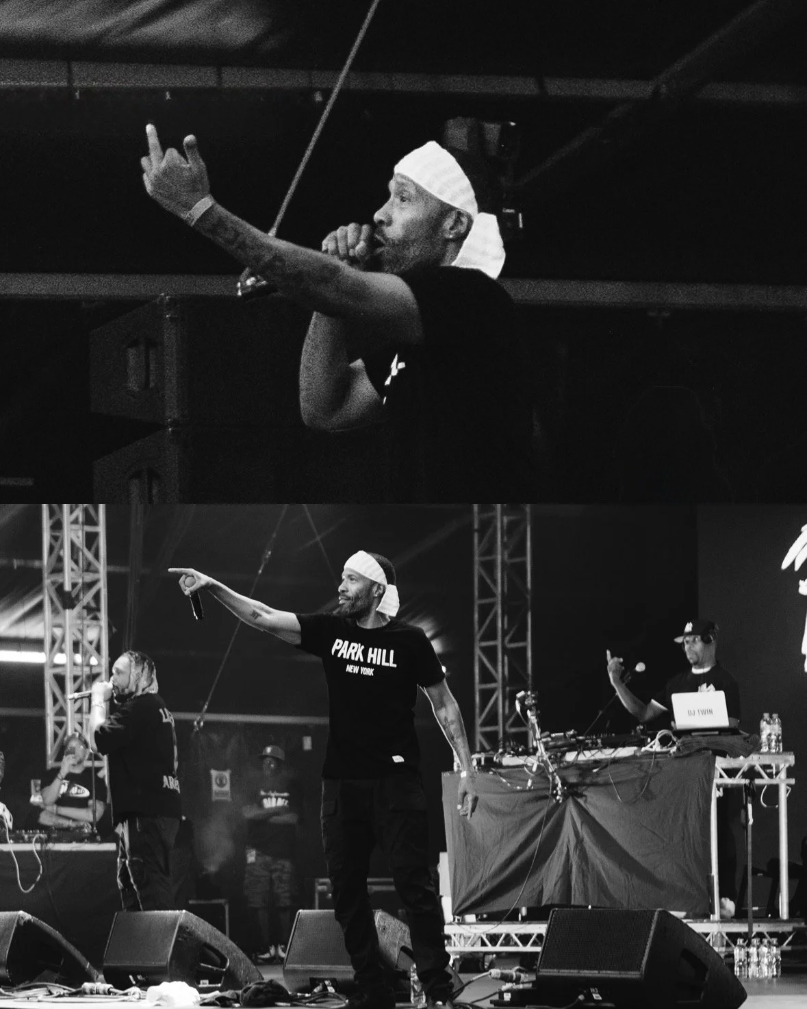 A male performer with tattoos, Redman, wearing a white bandana and a black T-shirt with 'PARK HILL NEW YORK' printed on it, singing and pointing stage with a DJ, DJ Twin,  in the background at SouthFacing Festival in Crystal Palace