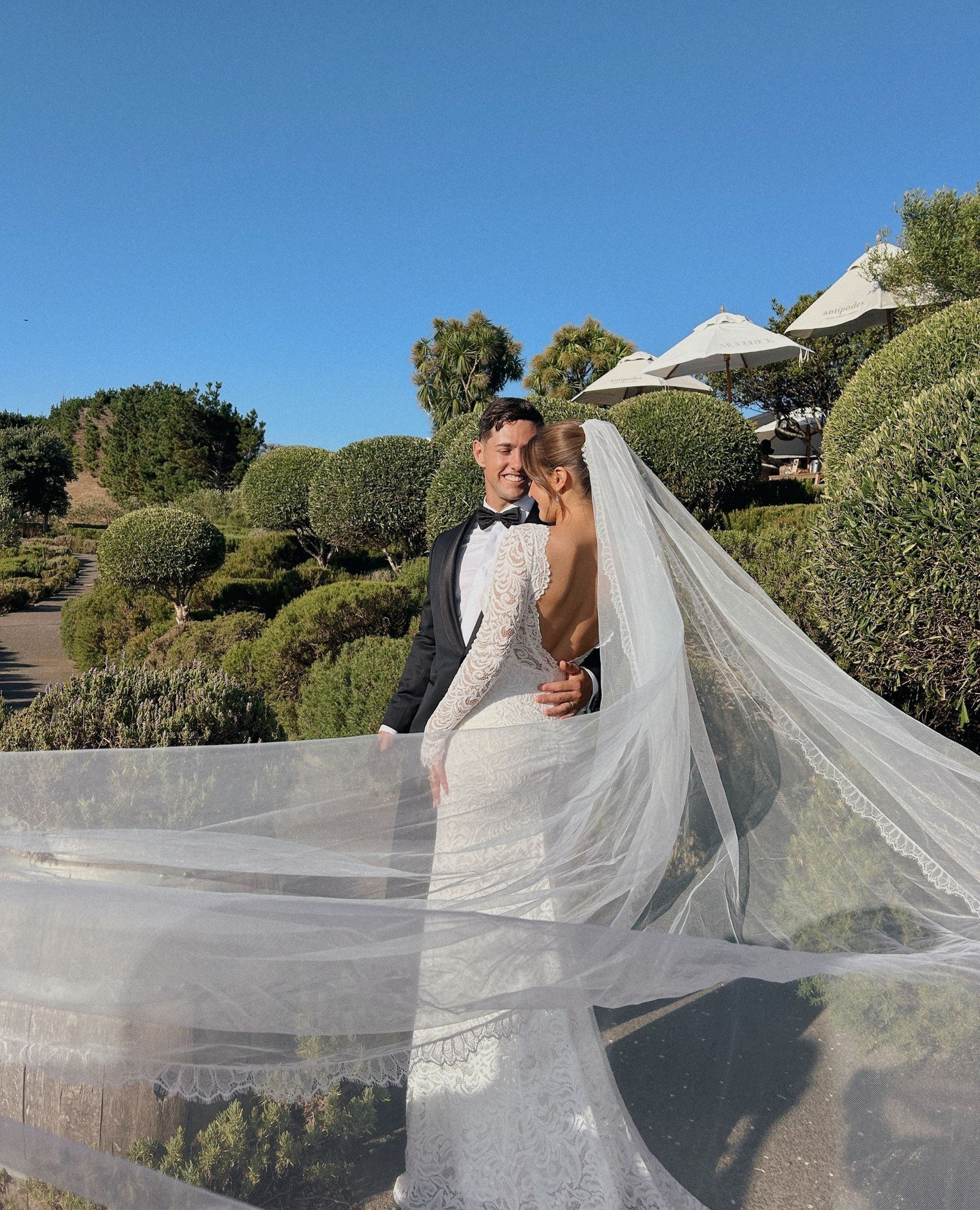 M&amp;L captured at Mudbrick Vineyard 🤍⁠
⁠
⁠bride @maddimmalone | groom @liammmalone | venue @mudbrick_nz @mudbrick_weddings | dress @grace_loves_lace | suit @boss | makeup/hair @penton.andco | florist @bloomerie.weddings | signage @paperdarlingnz |