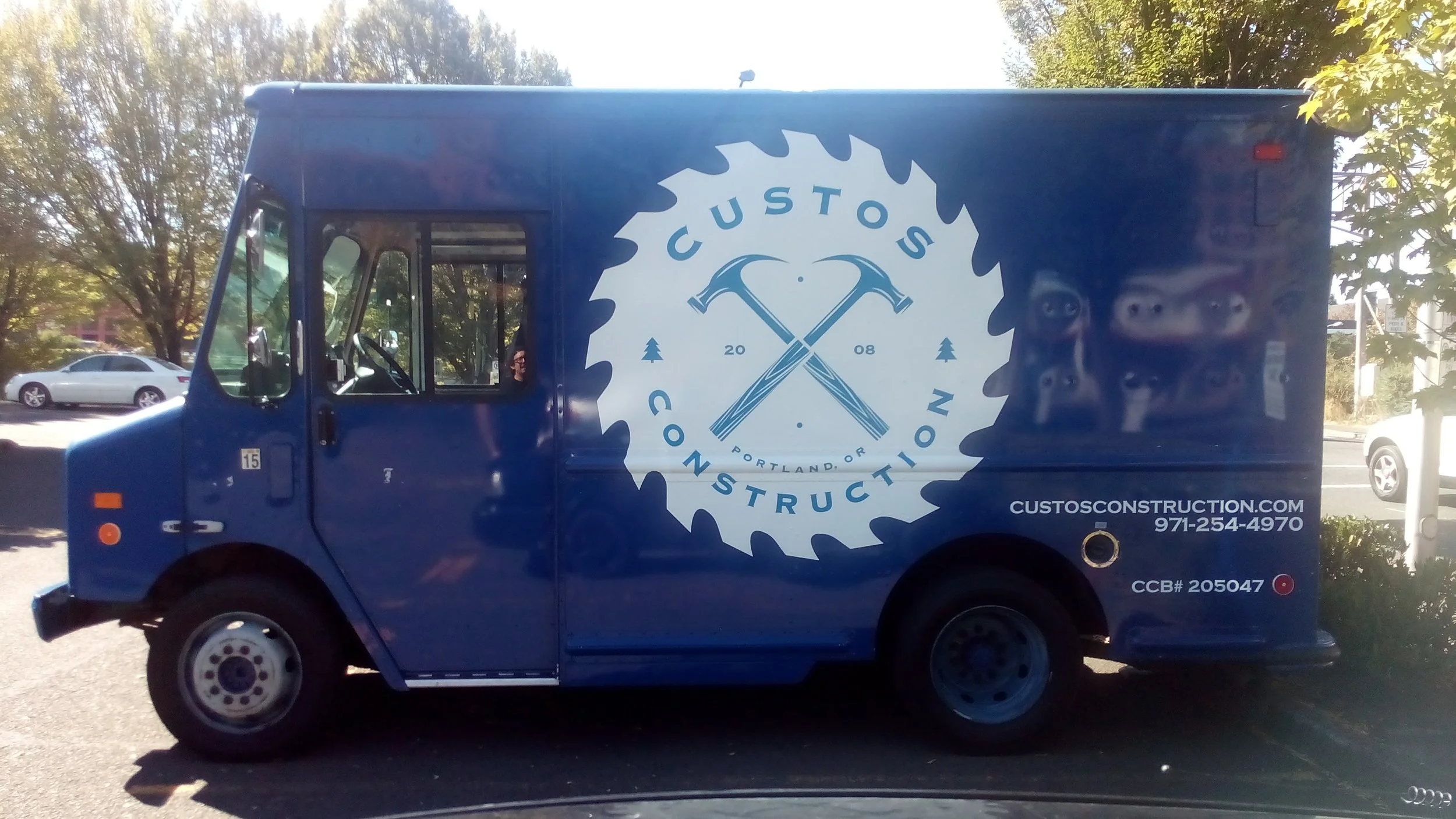 Vehicle wrap done at Fast Signs for custos construction in portland, or.