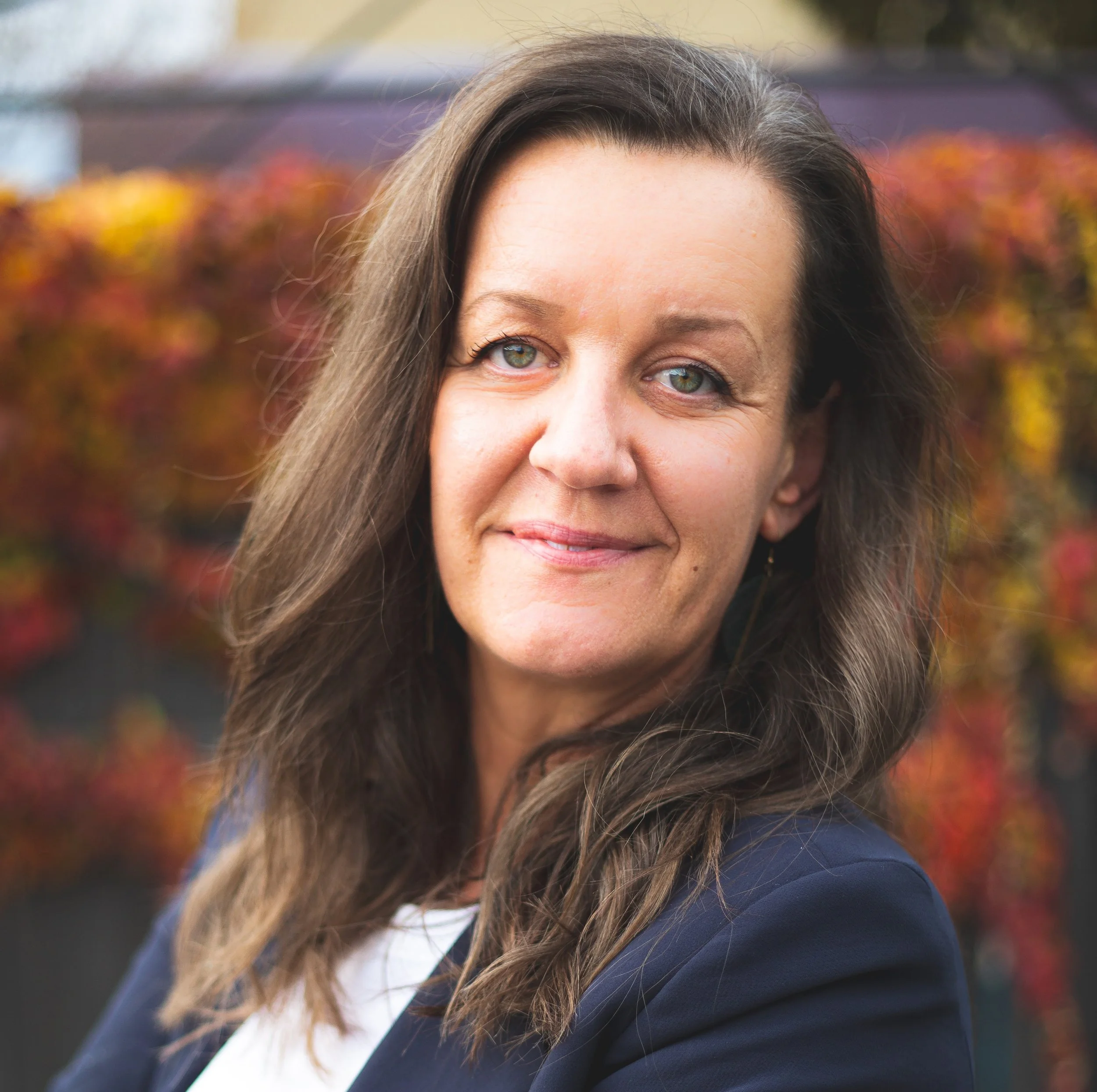 women standing in a field 