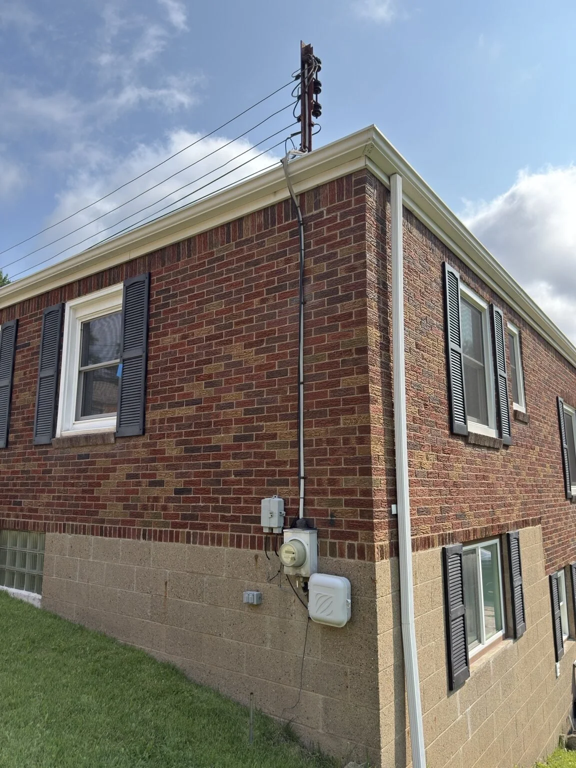 Original 100-amp overhead electrical service before upgrade in Ross Township