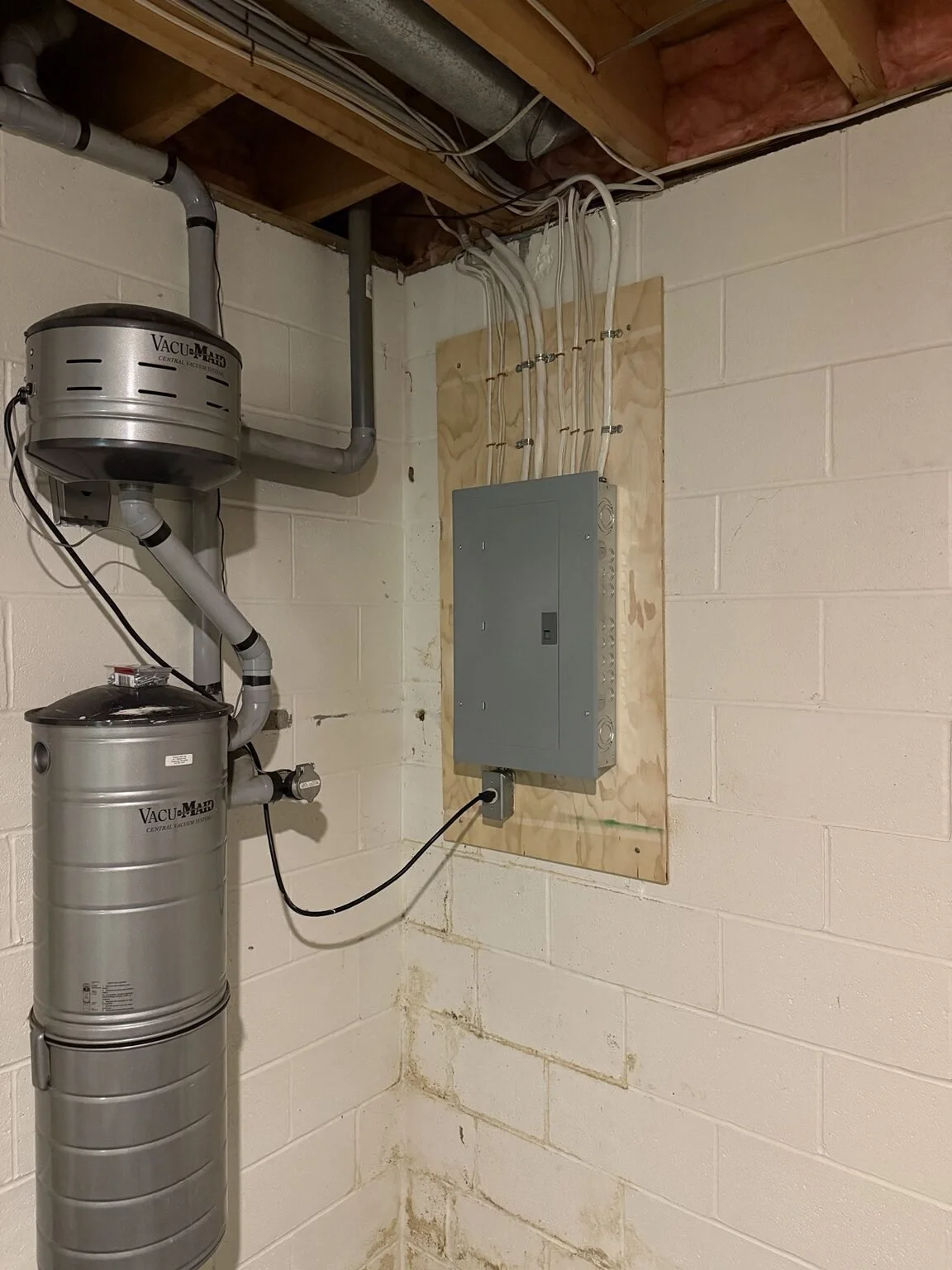 Finished basement subpanel replacement with a modern breaker panel installed by JJM Electric