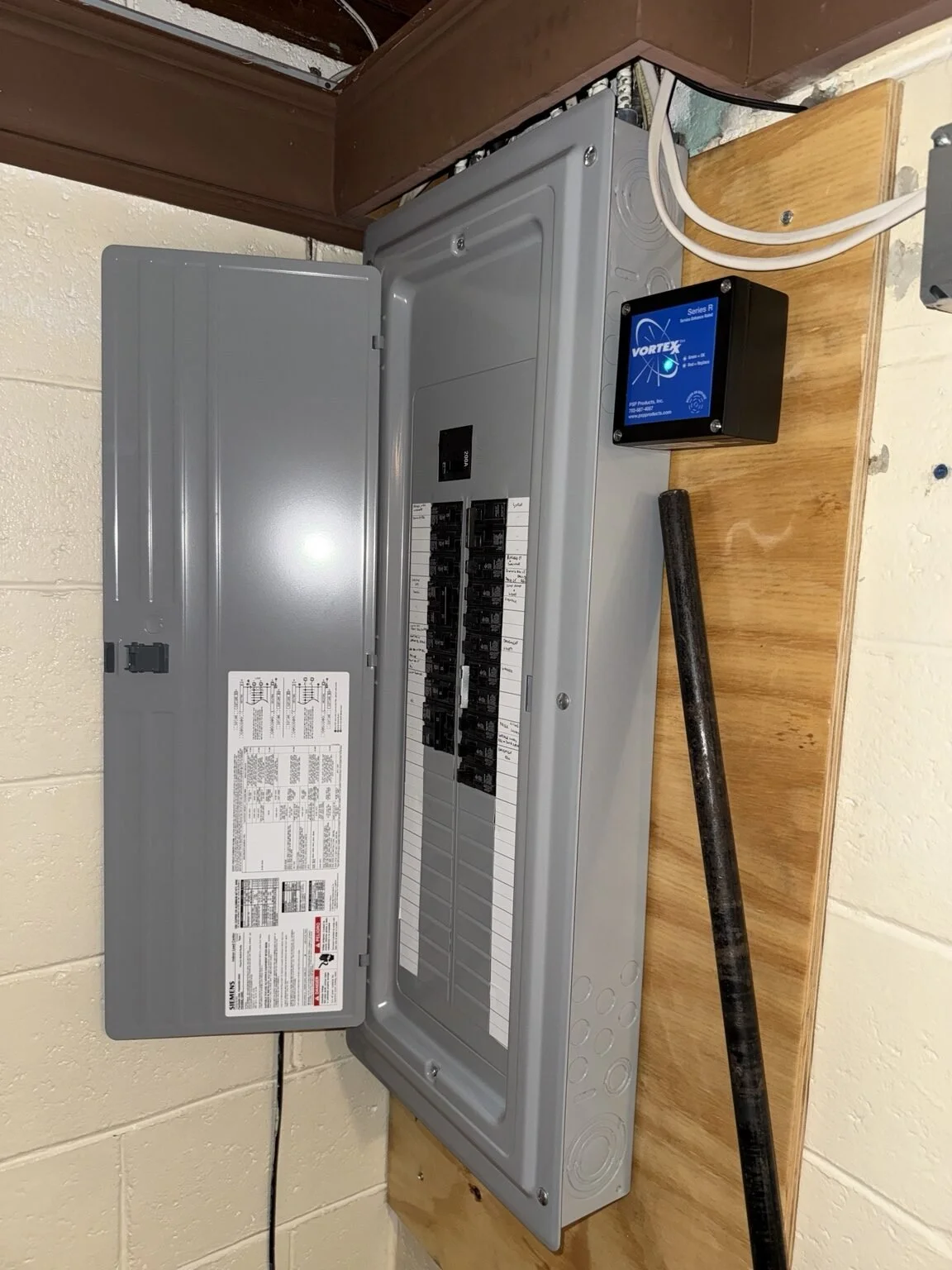 New 200-amp electrical panel with whole-house surge protection installed by JJM Electric